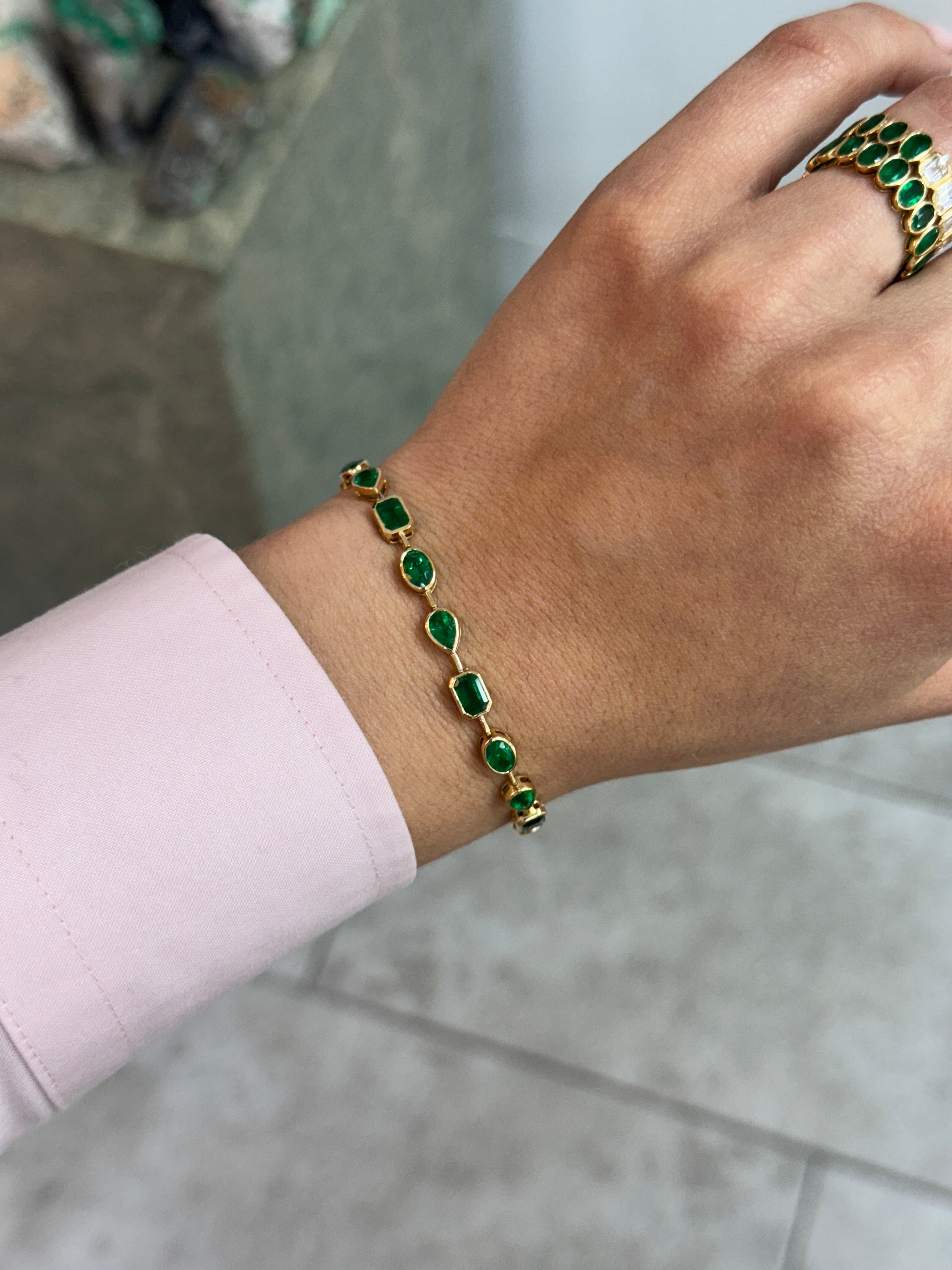 7.93tcw 18K Emerald Mixed Shape Tennis Bracelet- 7 Inches