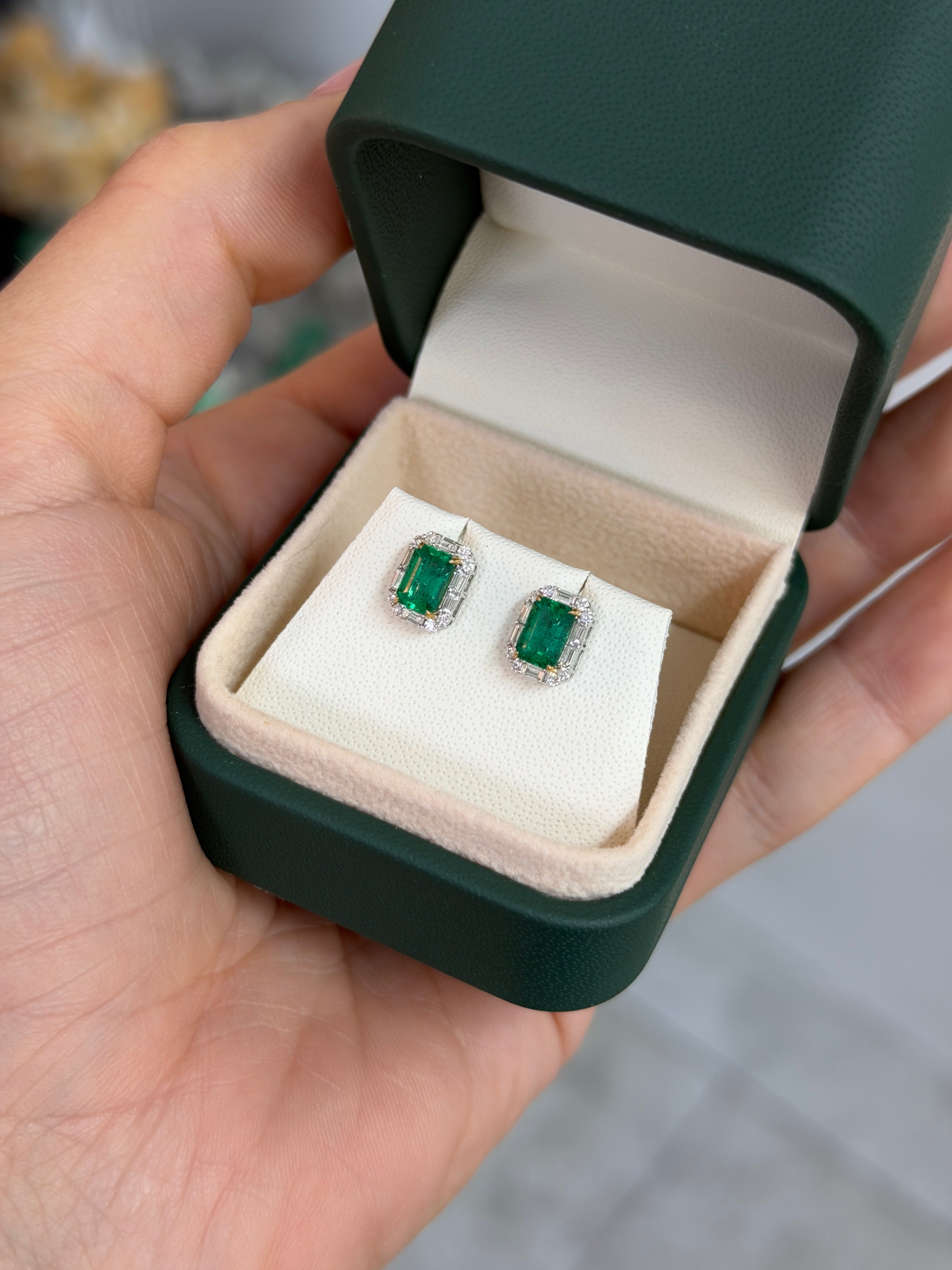 Natural emerald and baguette diamond halo stud earrings in 18K two-tone gold by JR Colombian Emeralds.