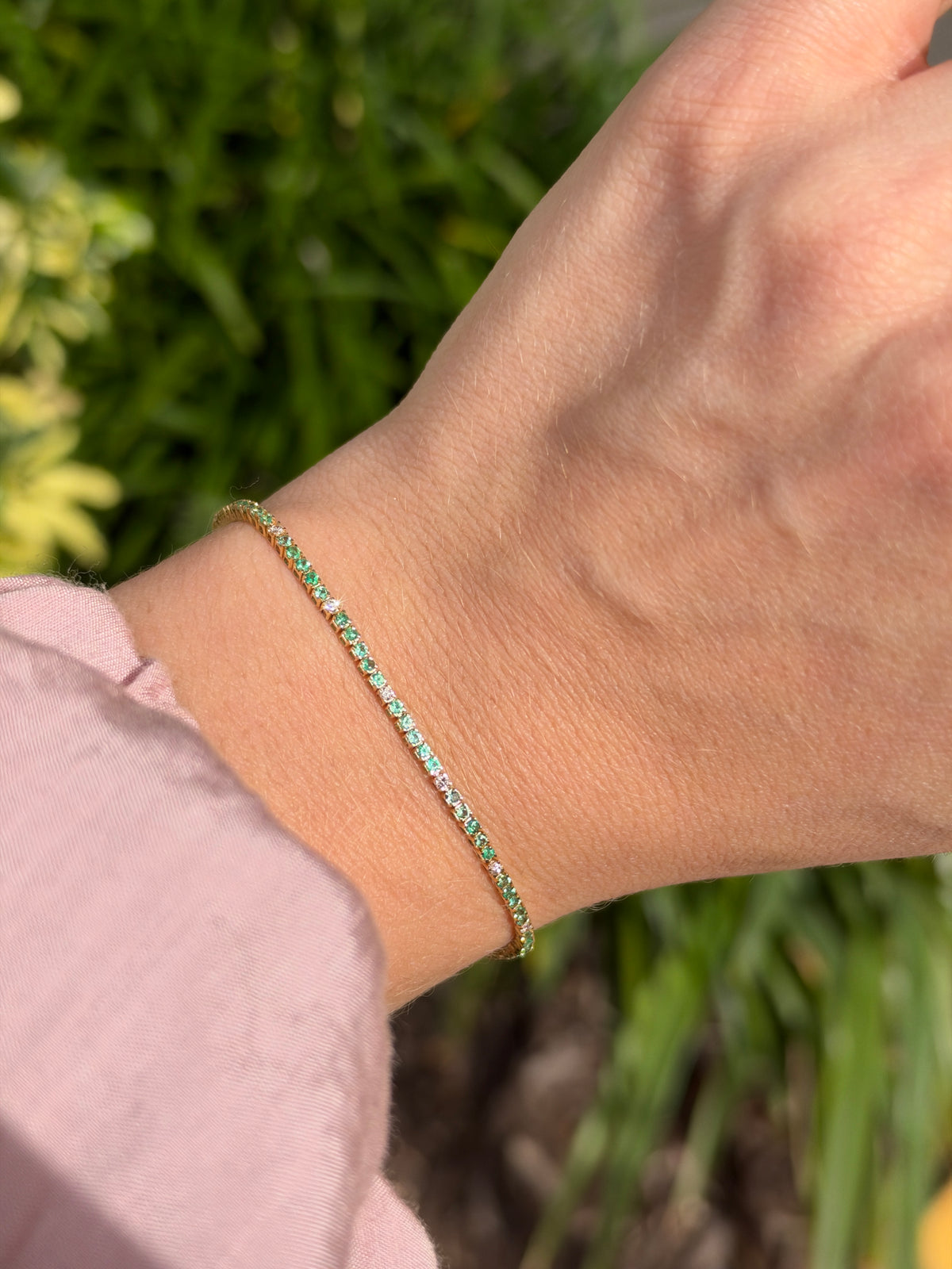Petite 1.14tcw emerald and diamond tennis bracelet in 14K yellow gold, 7-inch length, featuring JR Colombian Emeralds branding.