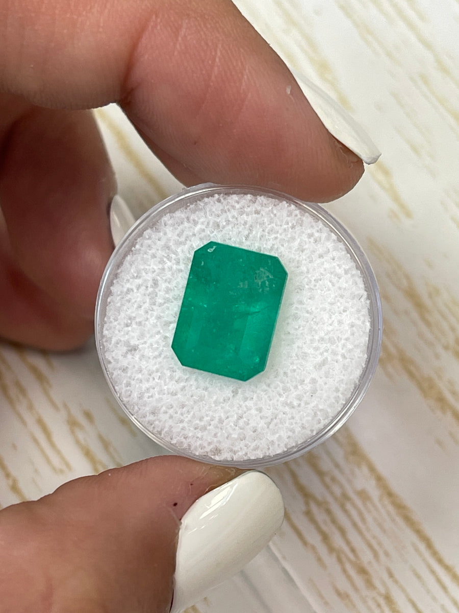 Emerald Cut Colombian Emerald: 6.47 Carat Earthy Green Gem