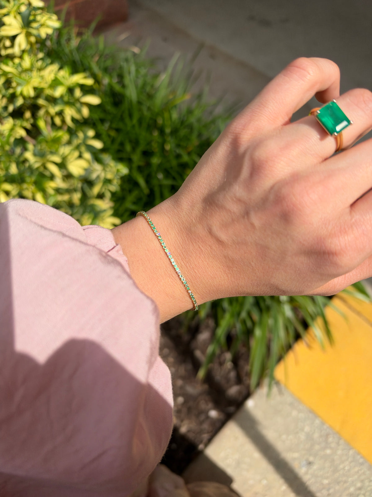 Petite 1.14tcw emerald and diamond tennis bracelet in 14K yellow gold, 7-inch length, from JR Colombian Emeralds.