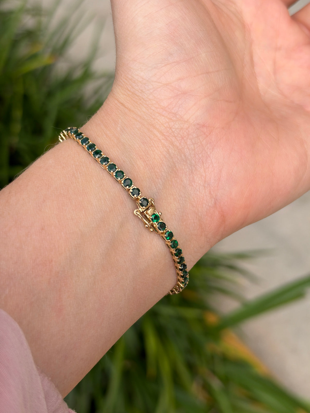 Natural dark green emerald tennis bracelet by JR Colombian Emeralds featuring 4.67tcw of emeralds set in 14K gold, 7 inches long.