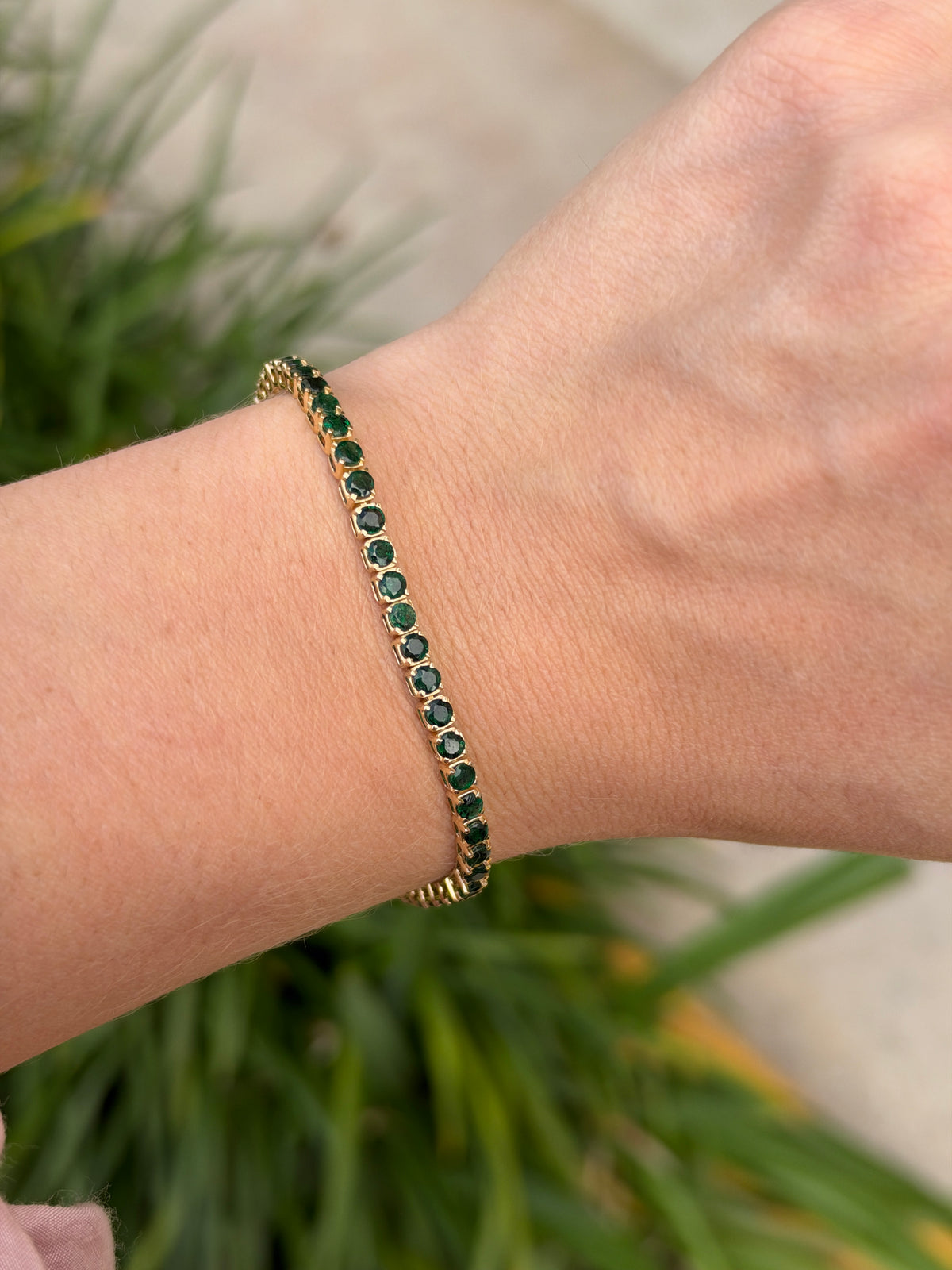 Natural dark green emerald tennis bracelet with 4.67tcw in 14K gold, 7-inch length, from JR Colombian Emeralds.