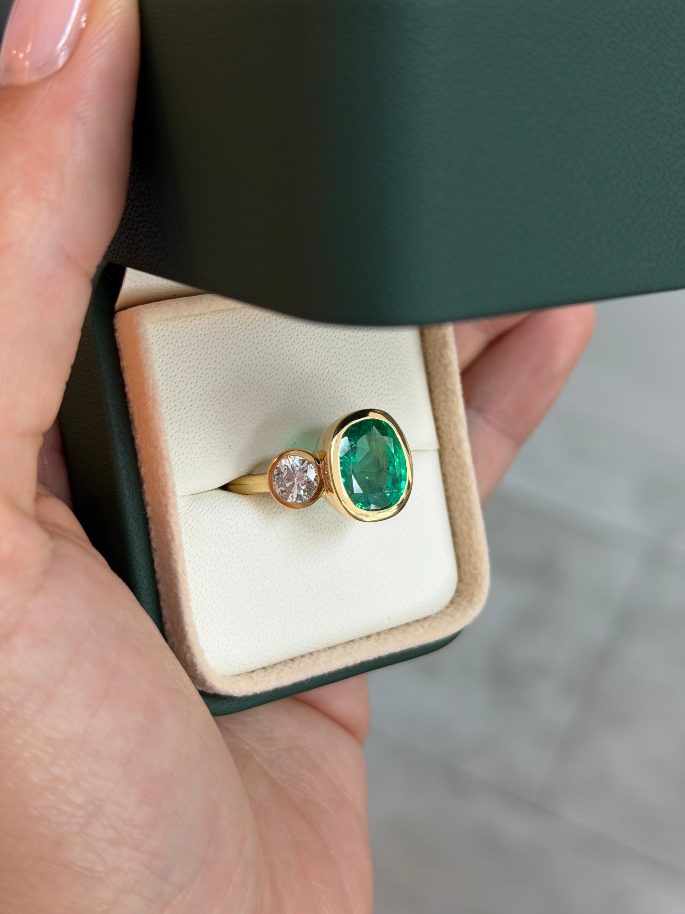 7.33tcw 18K Exclusive Cushion Colombian Emerald & Brilliant Round Diamond Three Stone Ring
