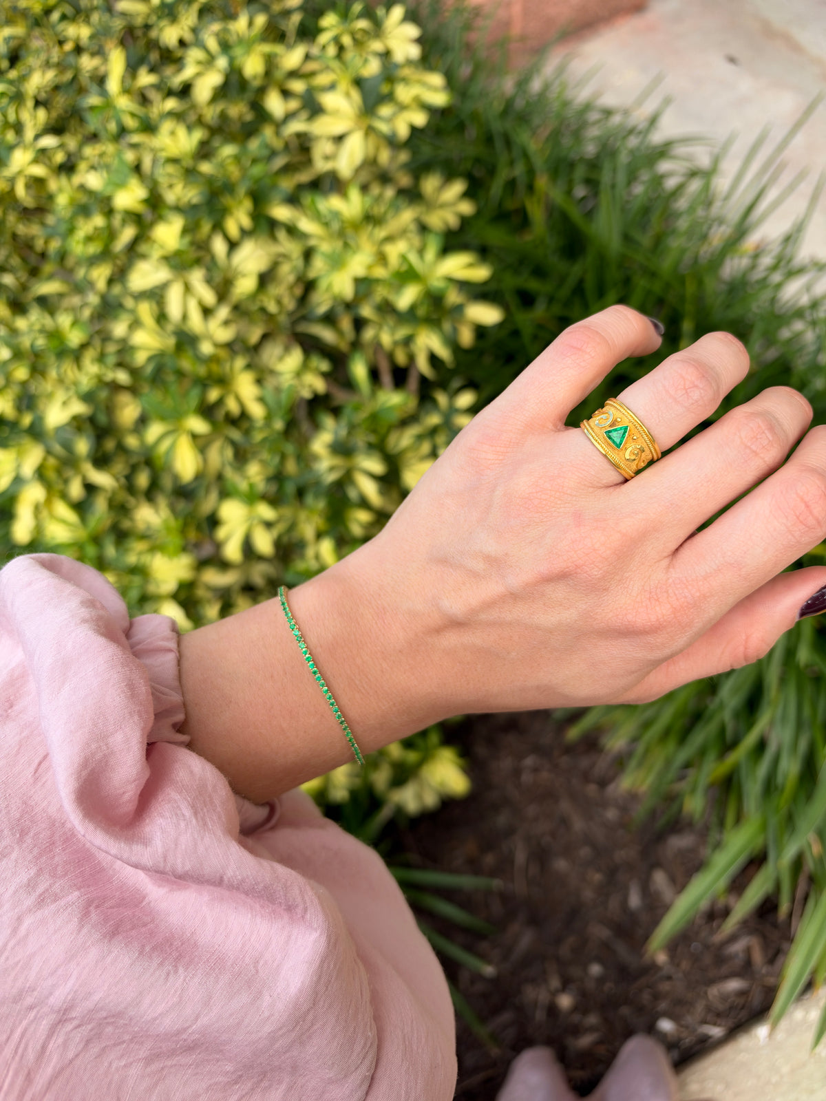 Petite 1.72tcw round emerald tennis bracelet in 14K gold by JR Colombian Emeralds, 7-inch length with fine craftsmanship.