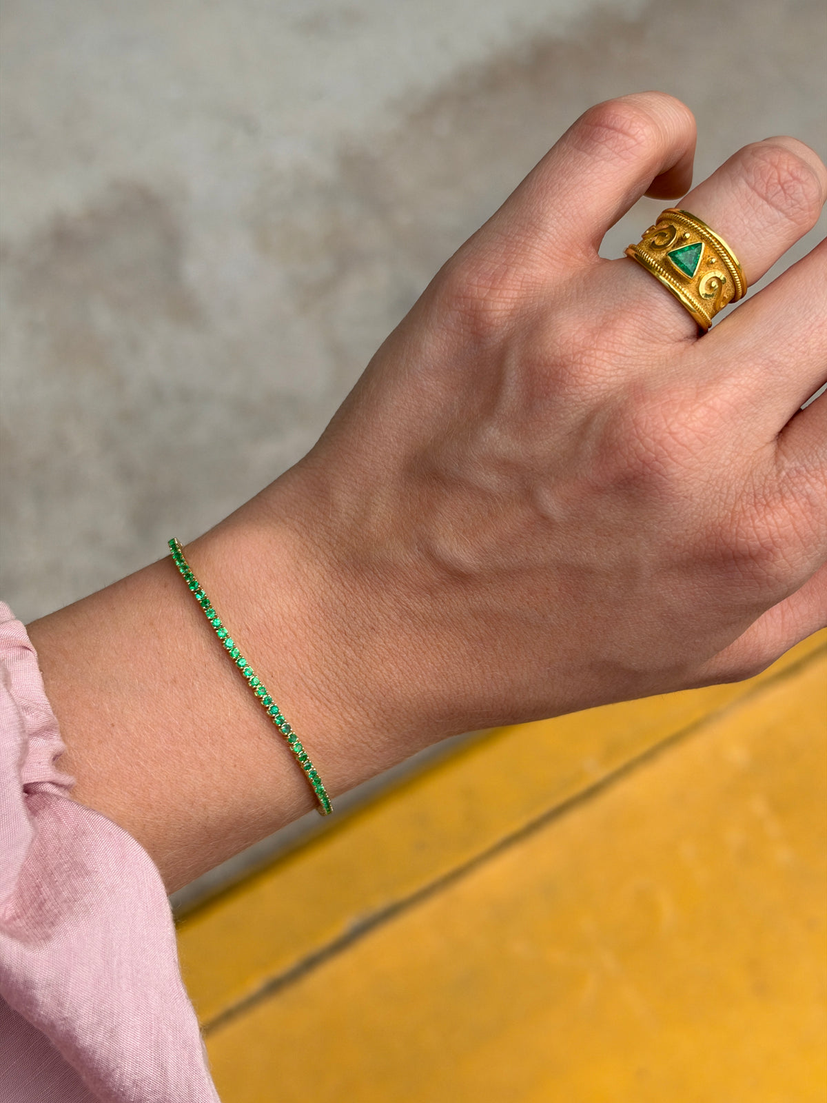 Petite 1.72tcw round emerald tennis bracelet in 14K gold by JR Colombian Emeralds, 7-inch length, detailed close-up image.