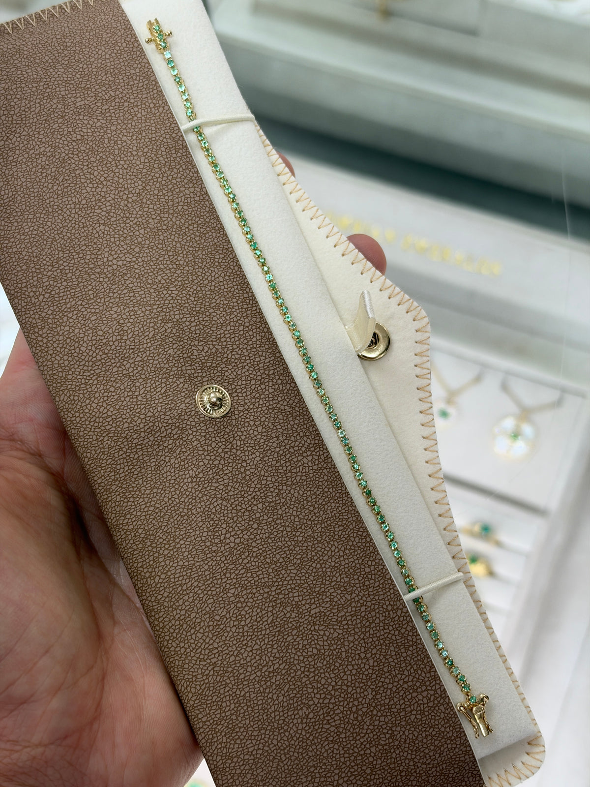 Light green round emerald tennis bracelet with 0.63 carats in 14K gold, 7-inch length, by JR Colombian Emeralds.