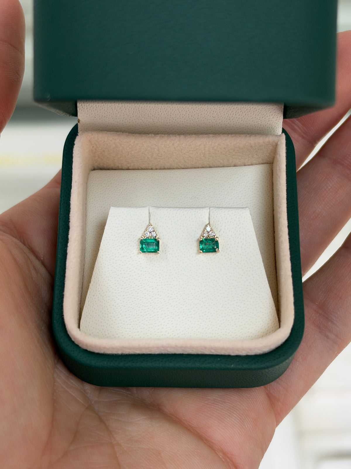 14K gold petite emerald and diamond stud earrings with natural green emeralds and sparkling diamonds from JR Colombian Emeralds.