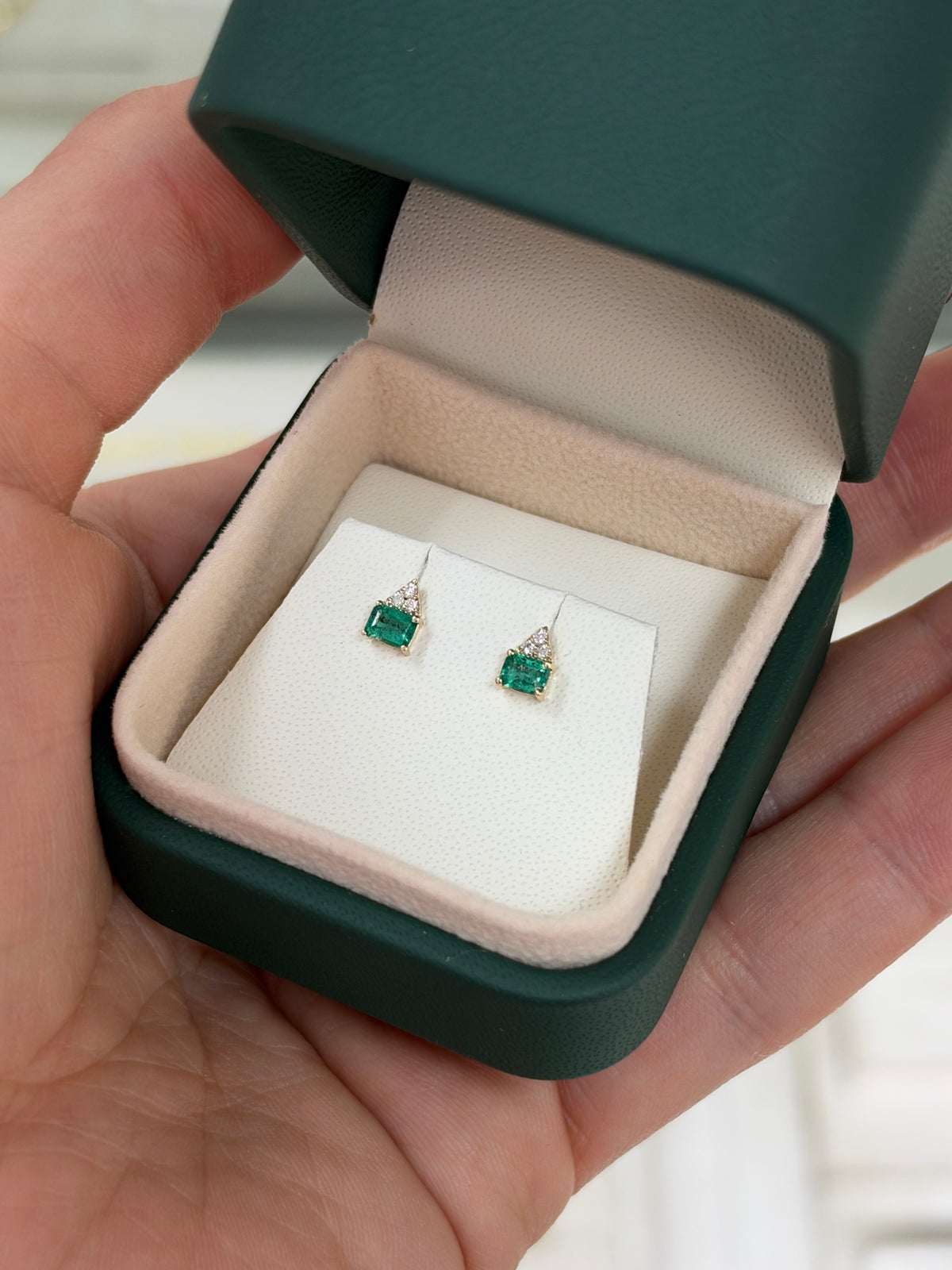 14K gold petite emerald and diamond stud earrings featuring natural green emeralds and sparkling diamonds, by JR Colombian Emeralds.