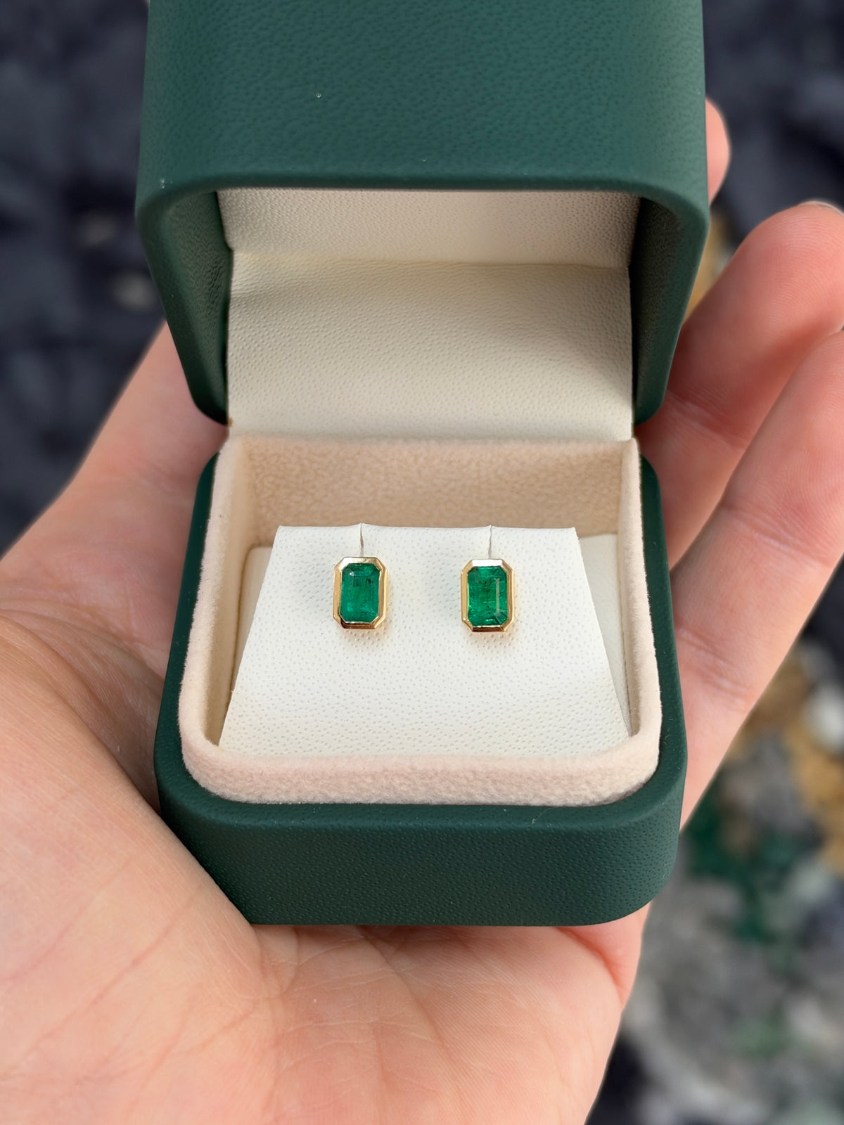 14K natural emerald cut stud earrings with bezel setting, featuring 1.20tcw Colombian emeralds by JR Colombian Emeralds.