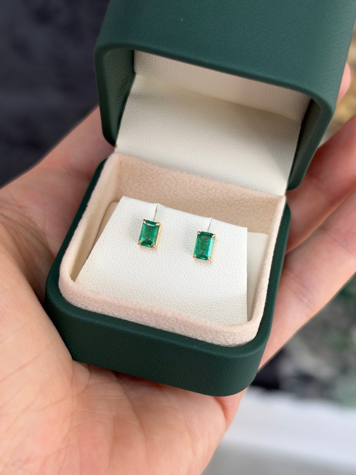 Medium green Zambian emerald cut stud earrings, 1.0 tcw, set in 14K gold, featuring JR Colombian Emeralds branding.