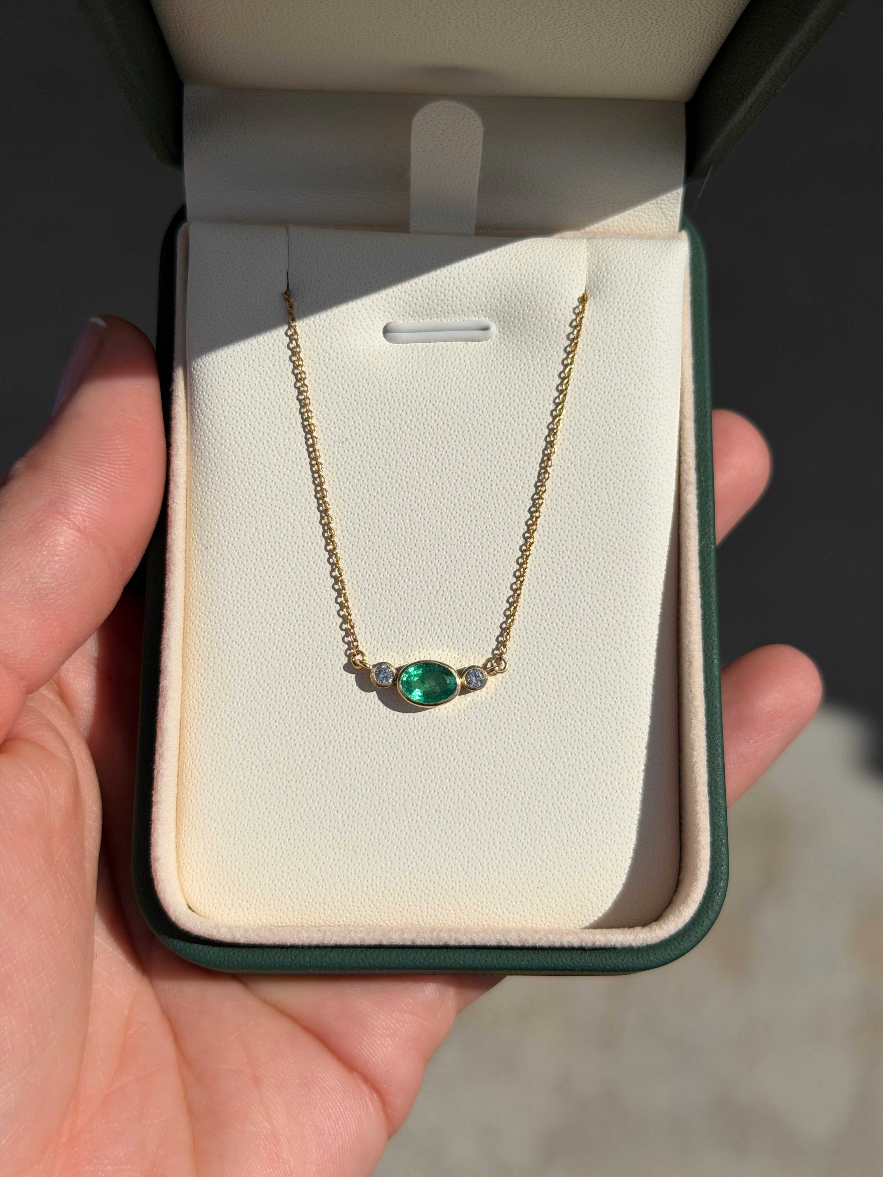 1.0tcw Everyday East-West Oval Emerald & Diamond Bezel Three Stone Necklace 14K