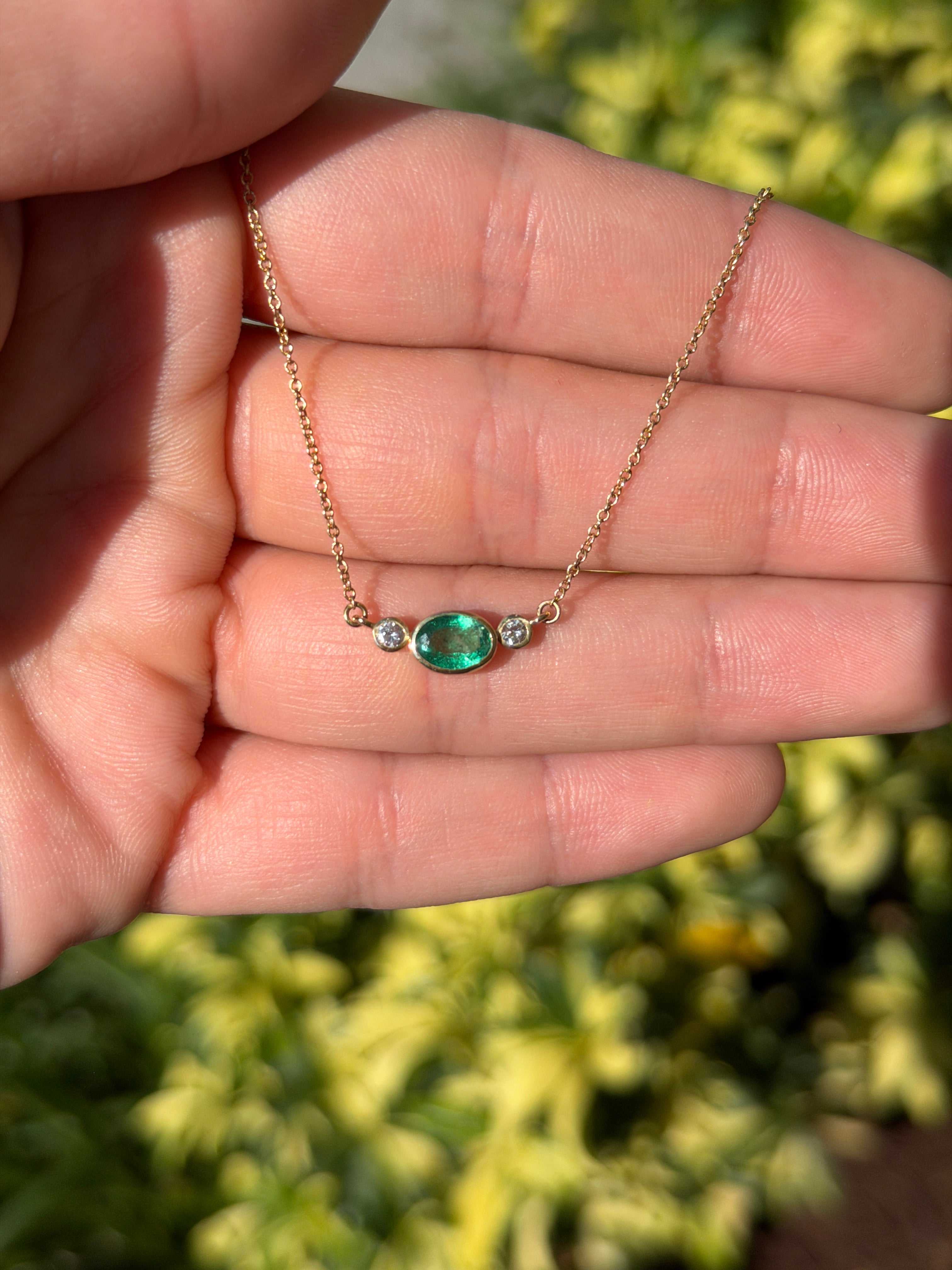 1.0tcw Everyday East-West Oval Emerald & Diamond Bezel Three Stone Necklace 14K