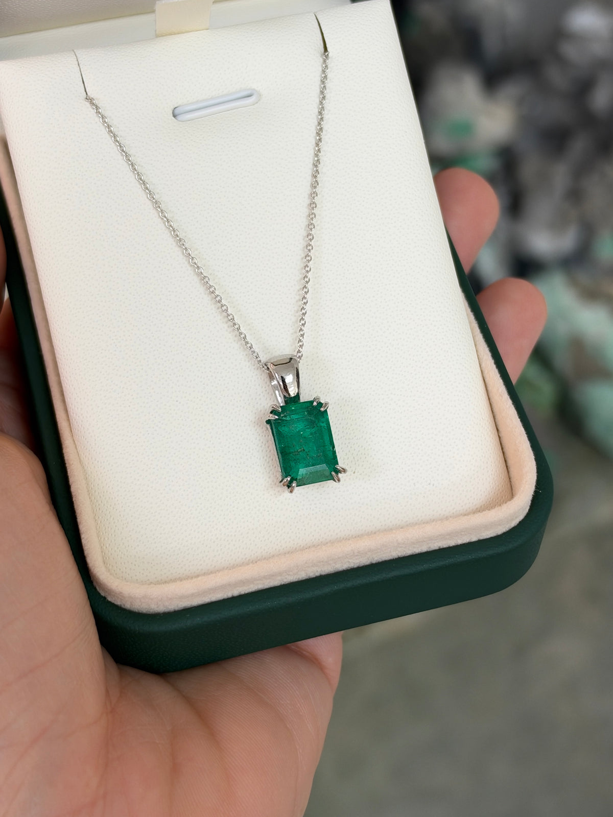 4.42ct Platinum Jungle Green Emerald Cut Emerald Solitaire Double Claw Prong Necklace
