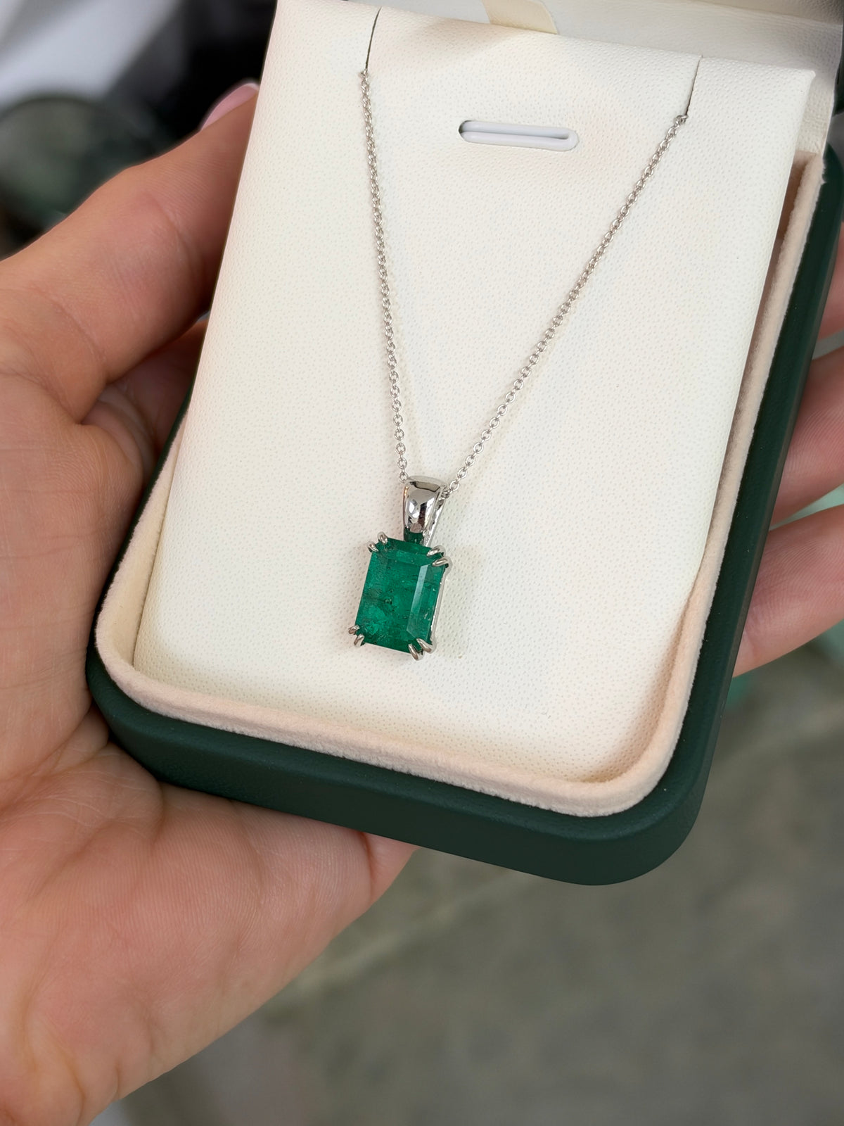 4.42ct Platinum Jungle Green Emerald Cut Emerald Solitaire Double Claw Prong Necklace