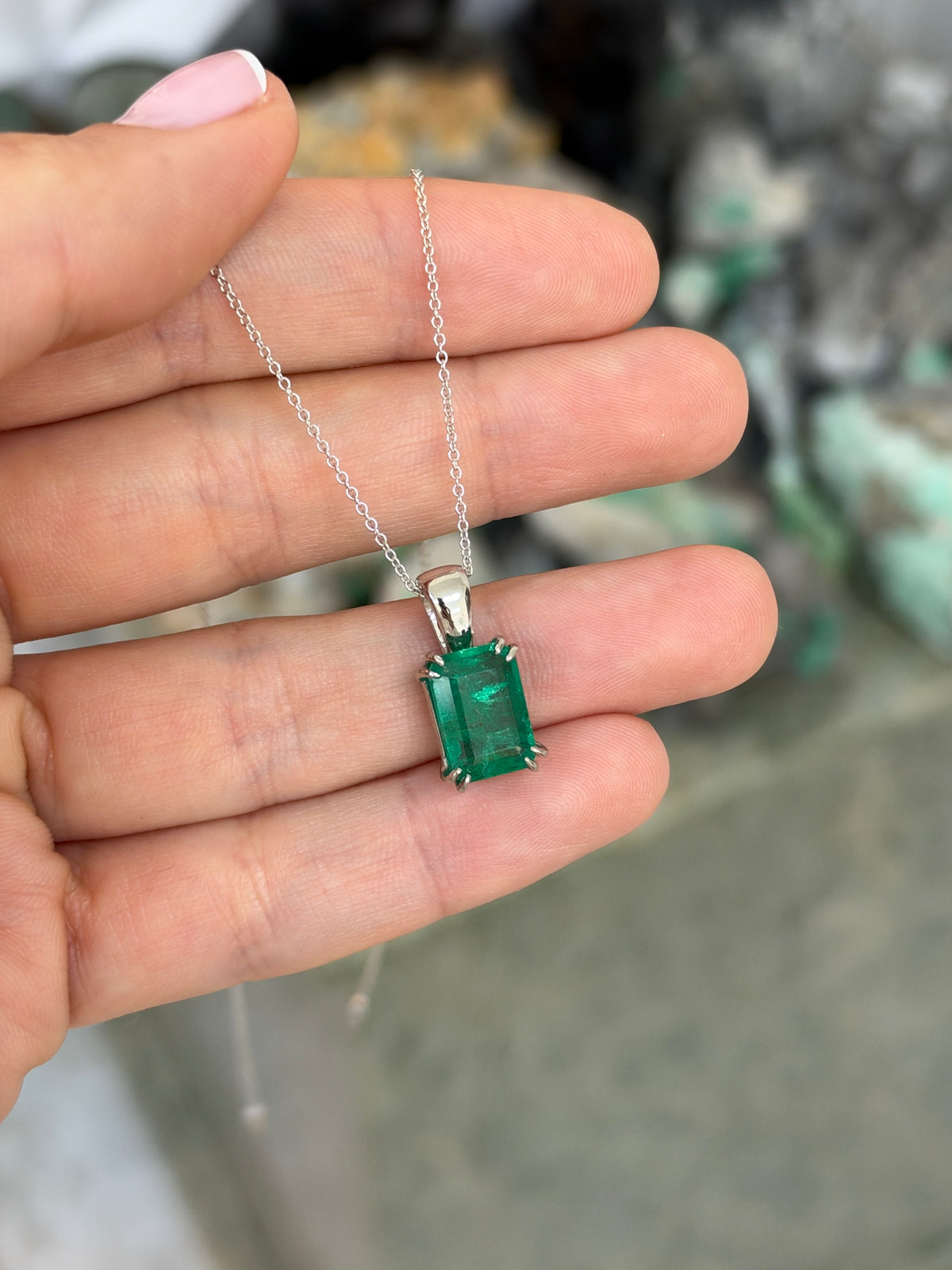 4.42ct Platinum Jungle Green Emerald Cut Emerald Solitaire Double Claw Prong Necklace