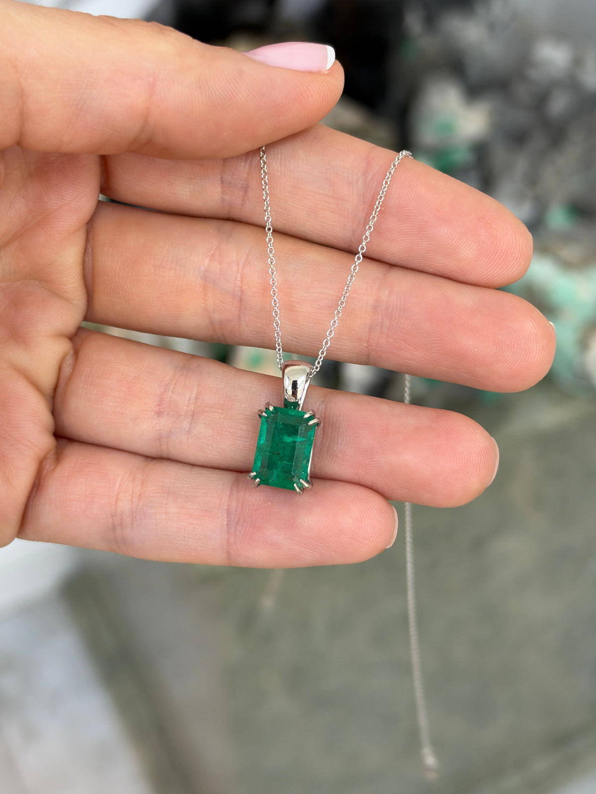 4.42ct Platinum Jungle Green Emerald Cut Emerald Solitaire Double Claw Prong Necklace
