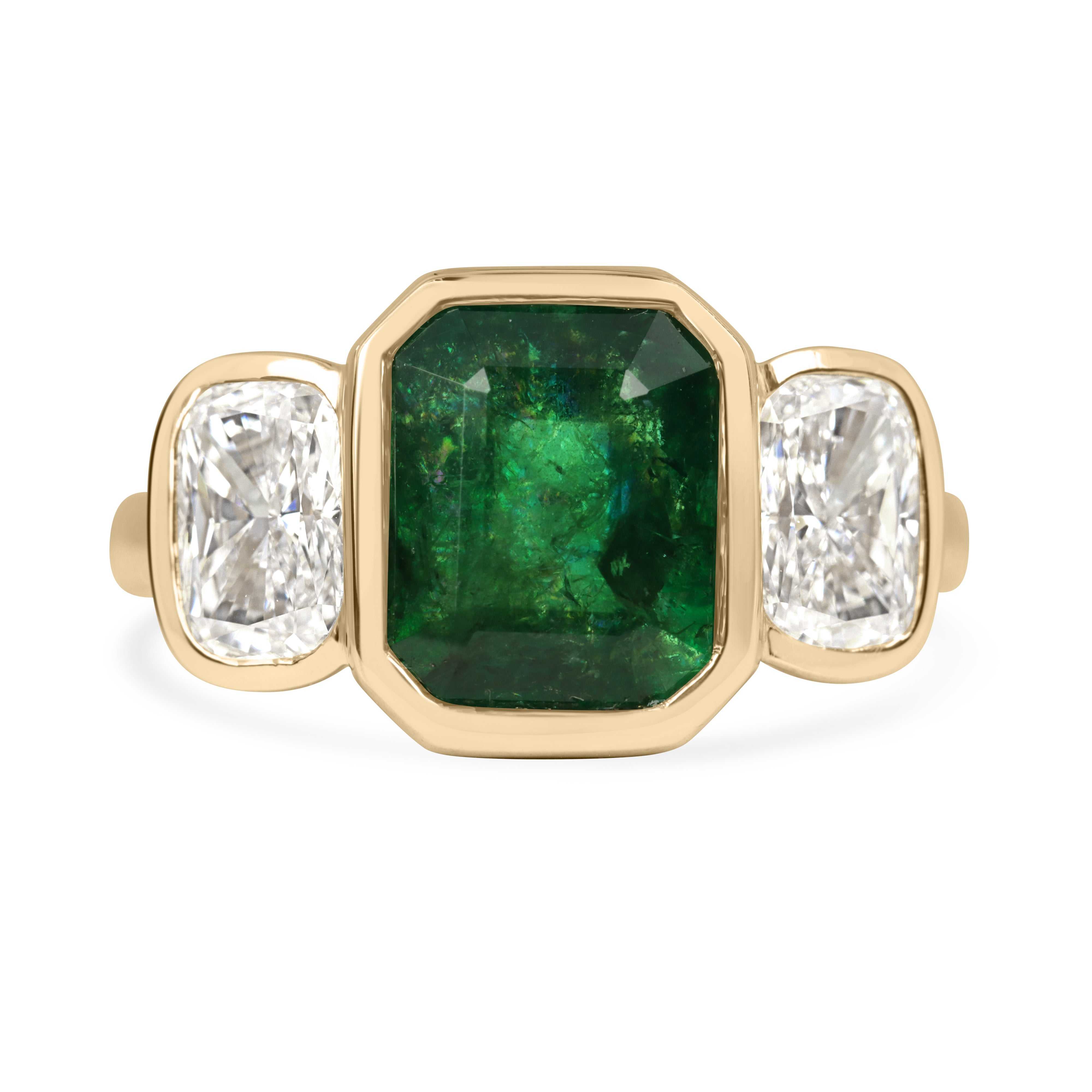 14K yellow gold bezel set emerald cut emerald and cushion cut lab diamond three-stone ring