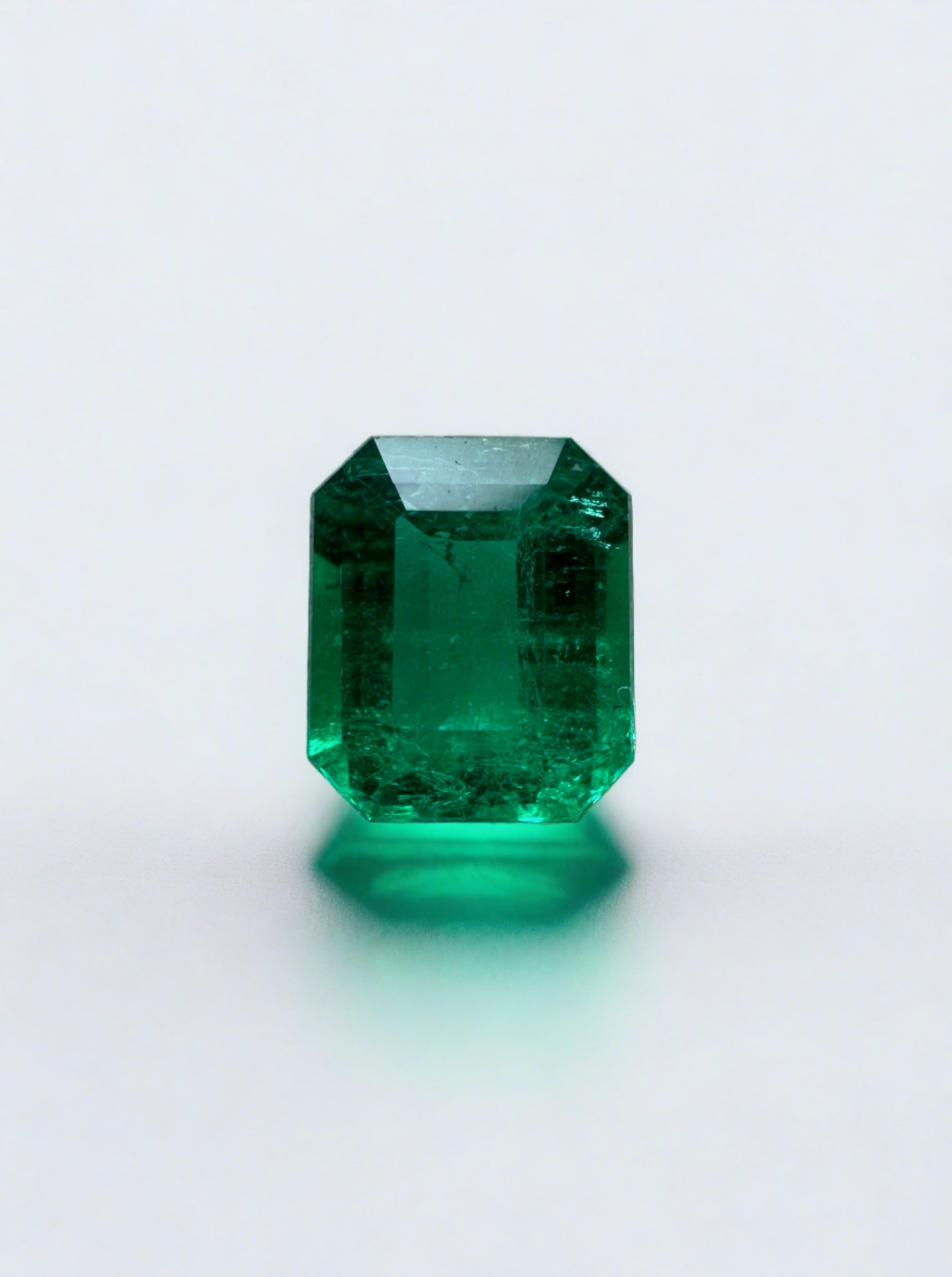 0.65 Carat AAA+ Vivid Muzo Green Natural Loose Colombian Emerald-Emerald Cut - JR Colombian Emeralds