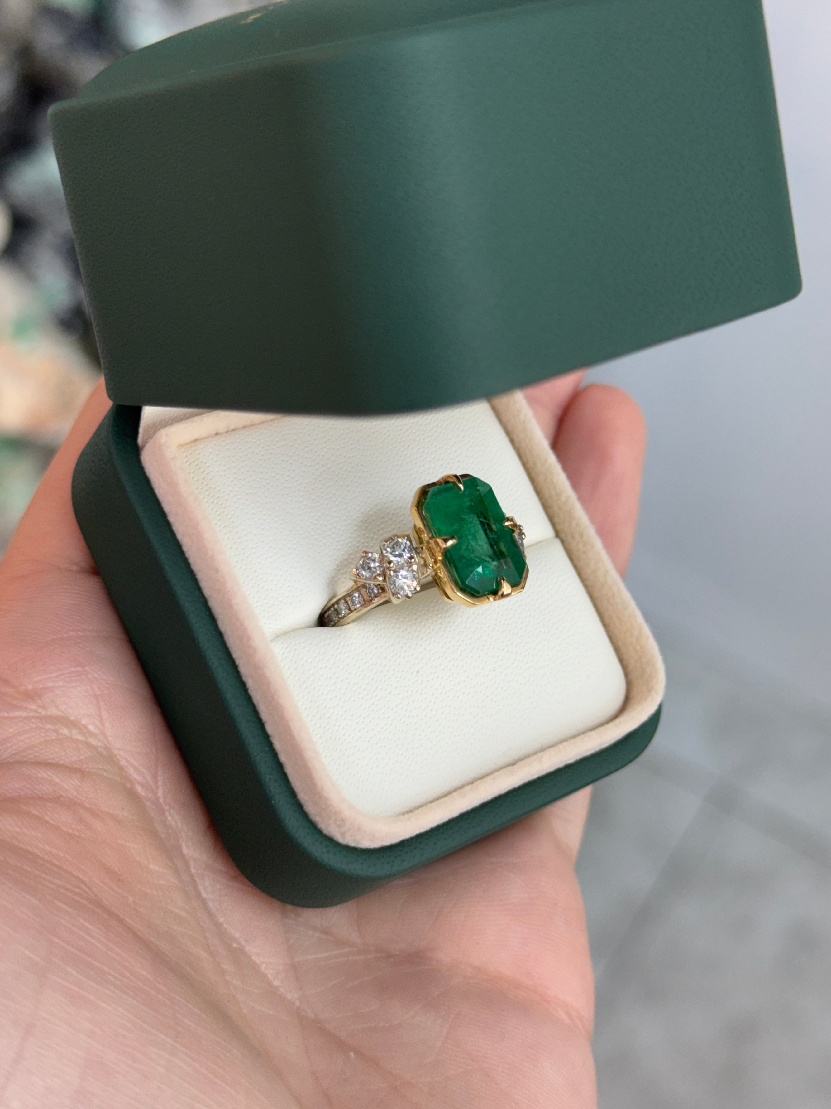 7.67ct 18K Compass Set Emerald Cut Emerald & Diamond Cluster Accent Right Hand Ring