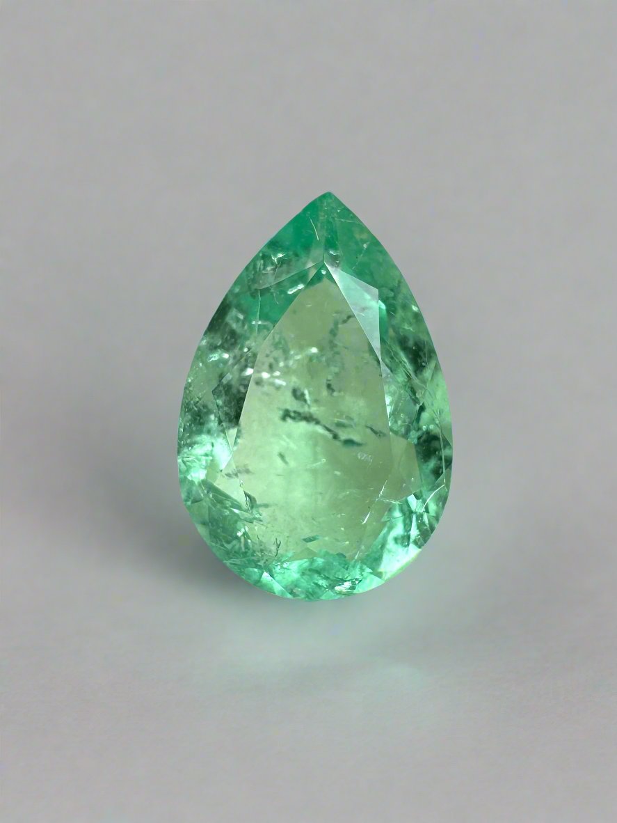 1.07 carat 9x6 Light Yellowish Green Natural Loose Colombian Emerald-Pear Cut