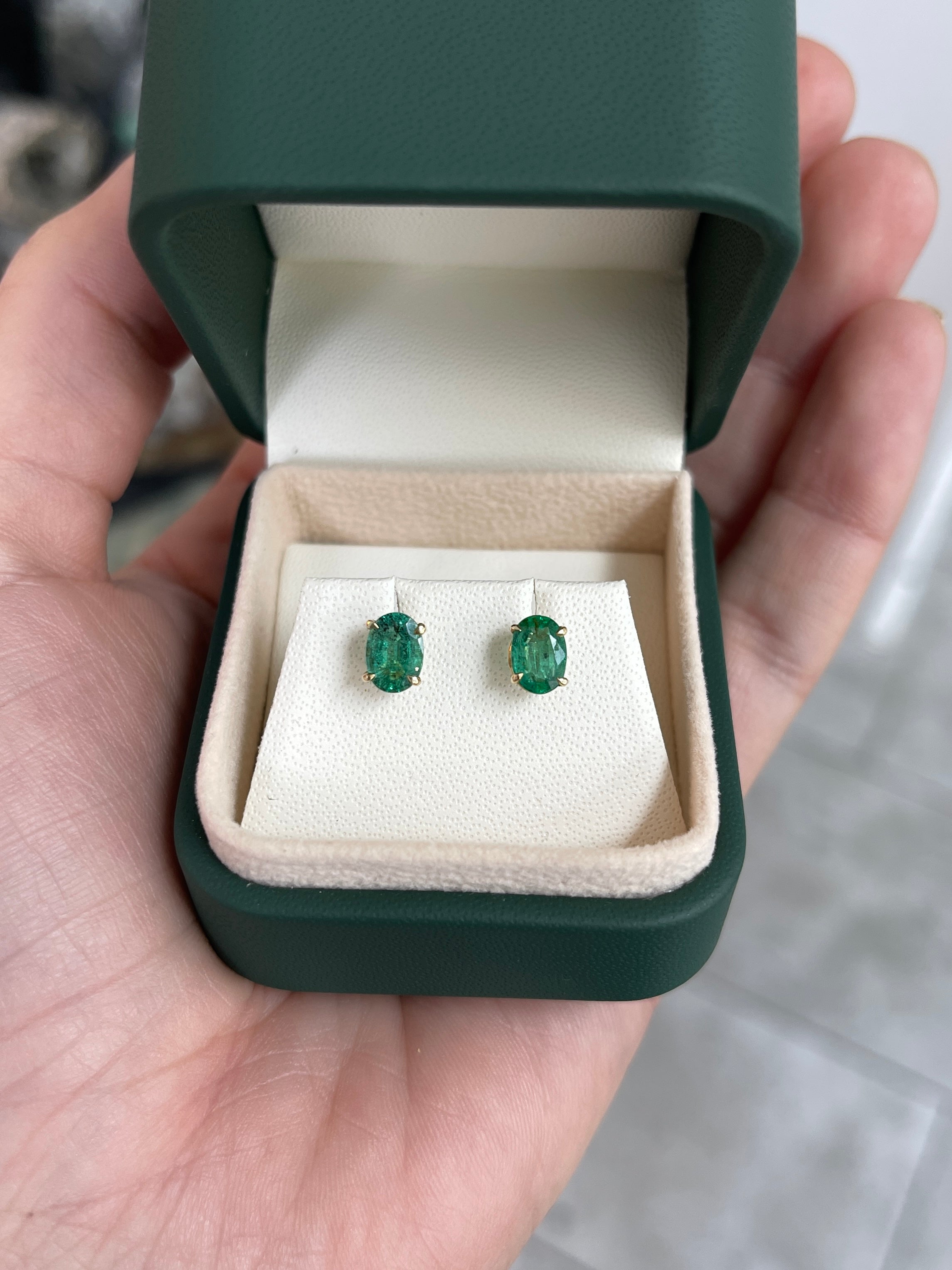 1.60tcw 14K Rich Green Oval Cut Four Prong Emerald Studs Earrings