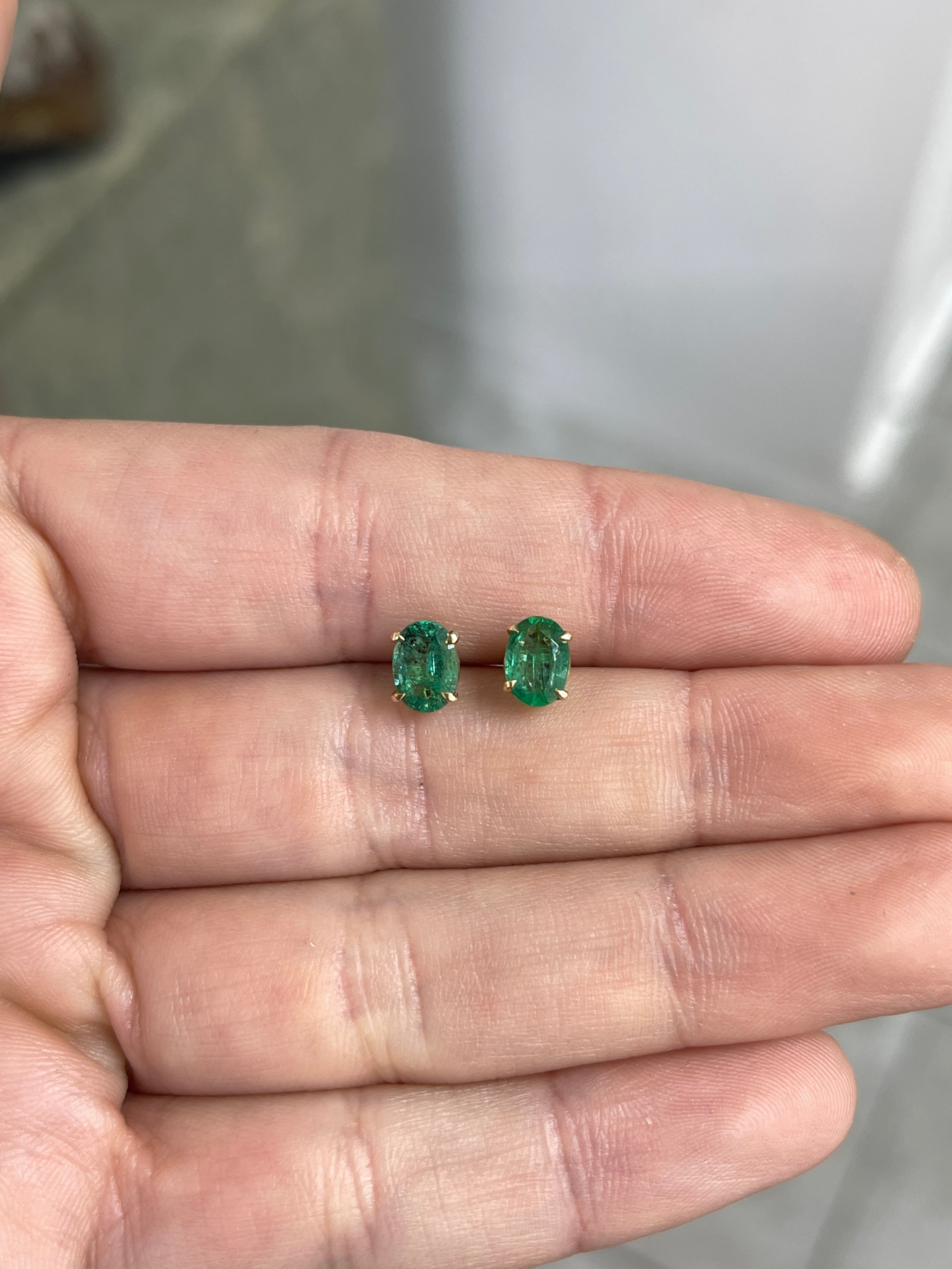 1.60tcw 14K Rich Green Oval Cut Four Prong Emerald Studs Earrings