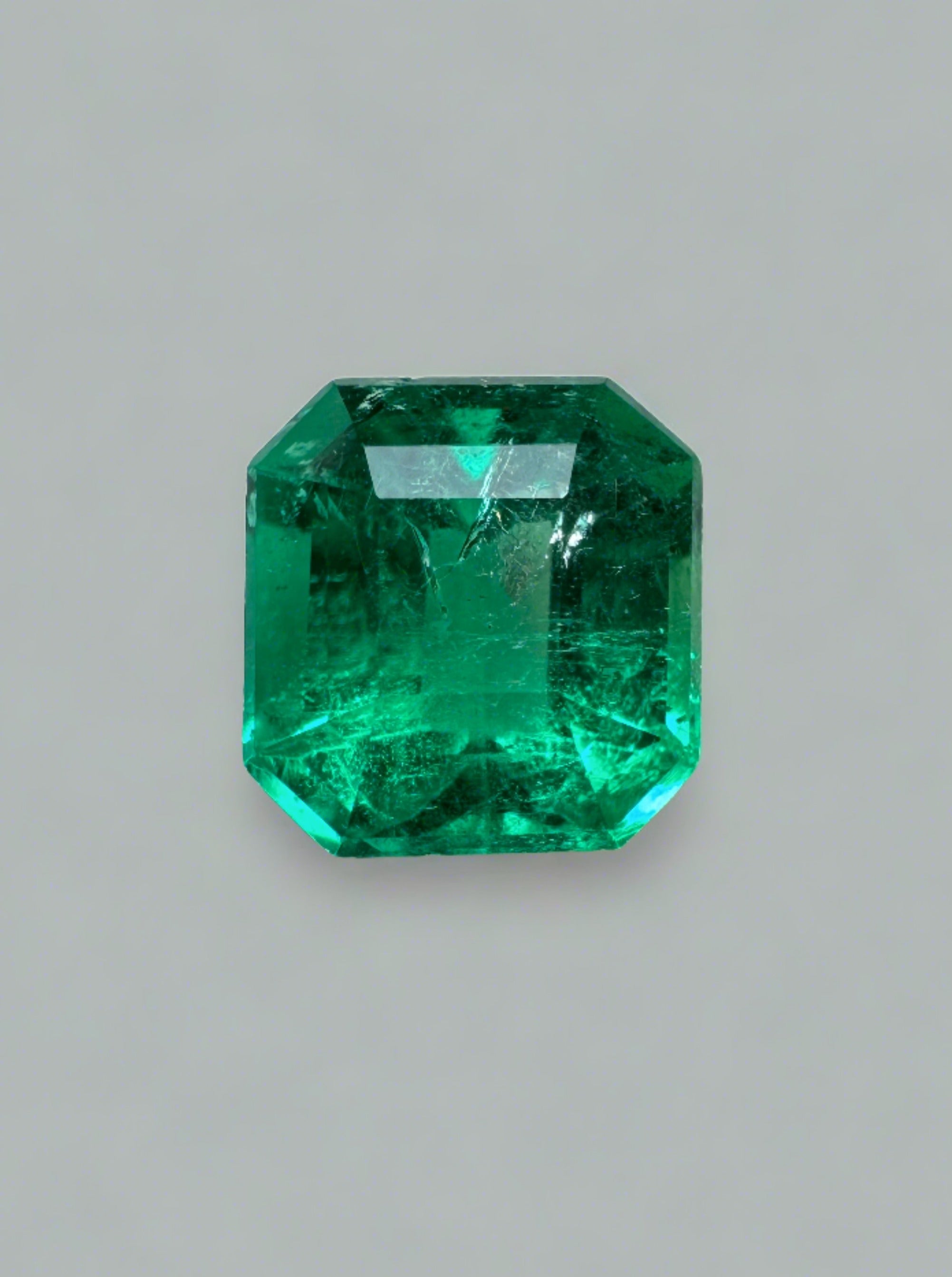 1.21 carat Asscher cut vivid green Colombian emerald.