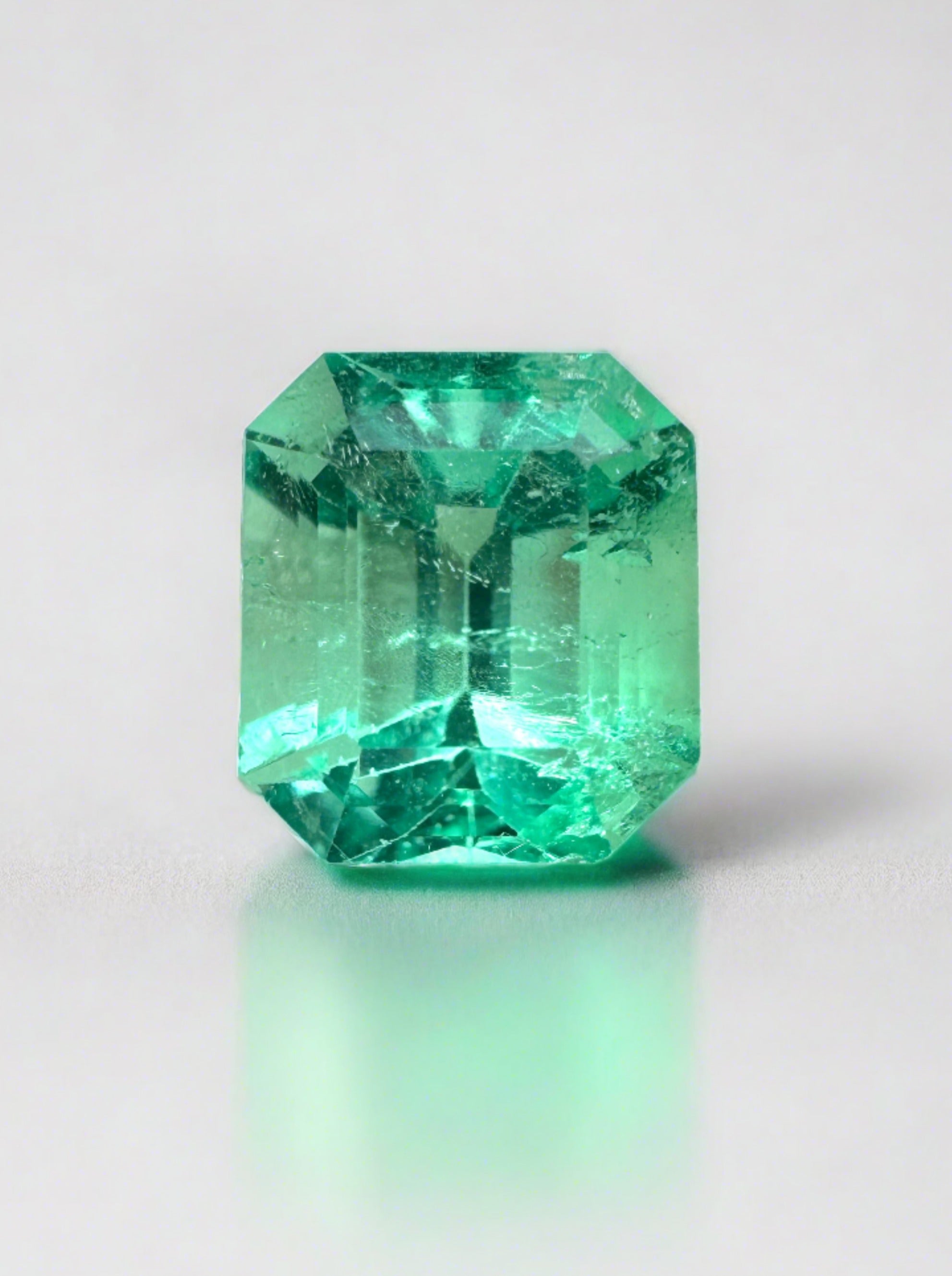 1.66 Carat VS Glowing Light Green Emerald Cut Natural Unset Colombian Emerald - JR Colombian Emeralds