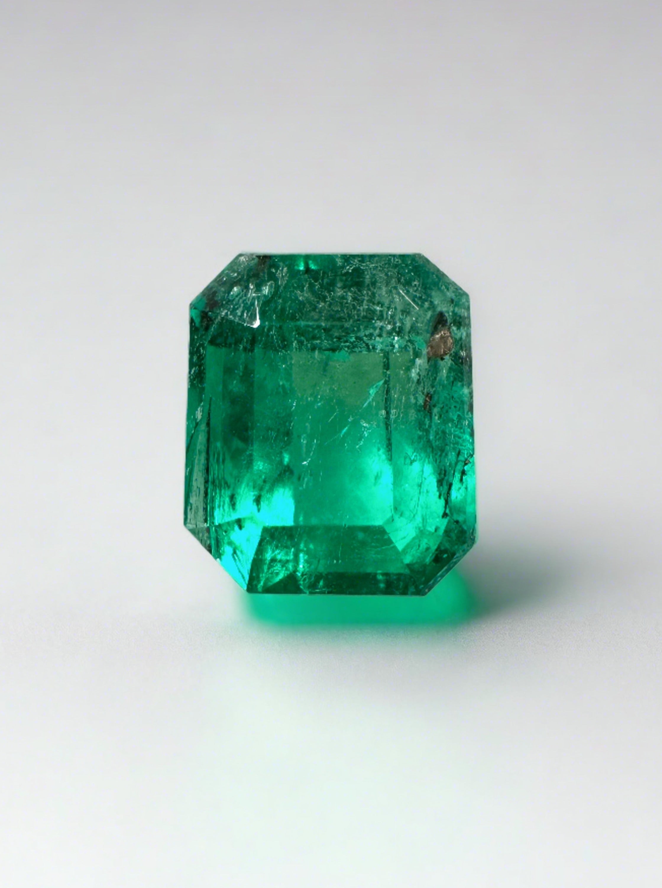 1.89 Carat Imperfect Muzo Green Natural Loose Colombian Emerald- Emerald Cut - JR Colombian Emeralds