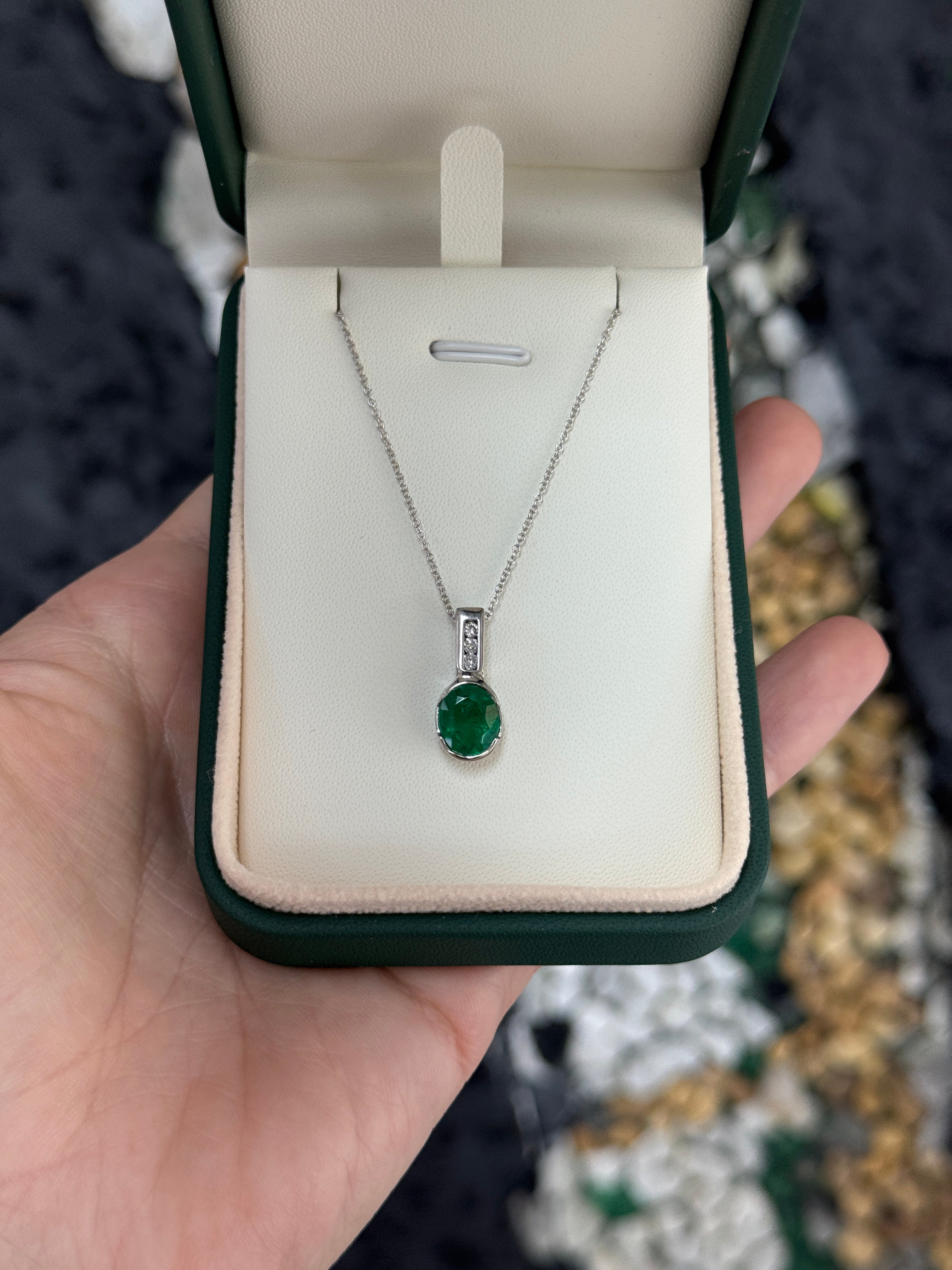 2.25tcw 14K Rich Oval Cut Emerald Half Bezel Set & Diamond Bale Accents