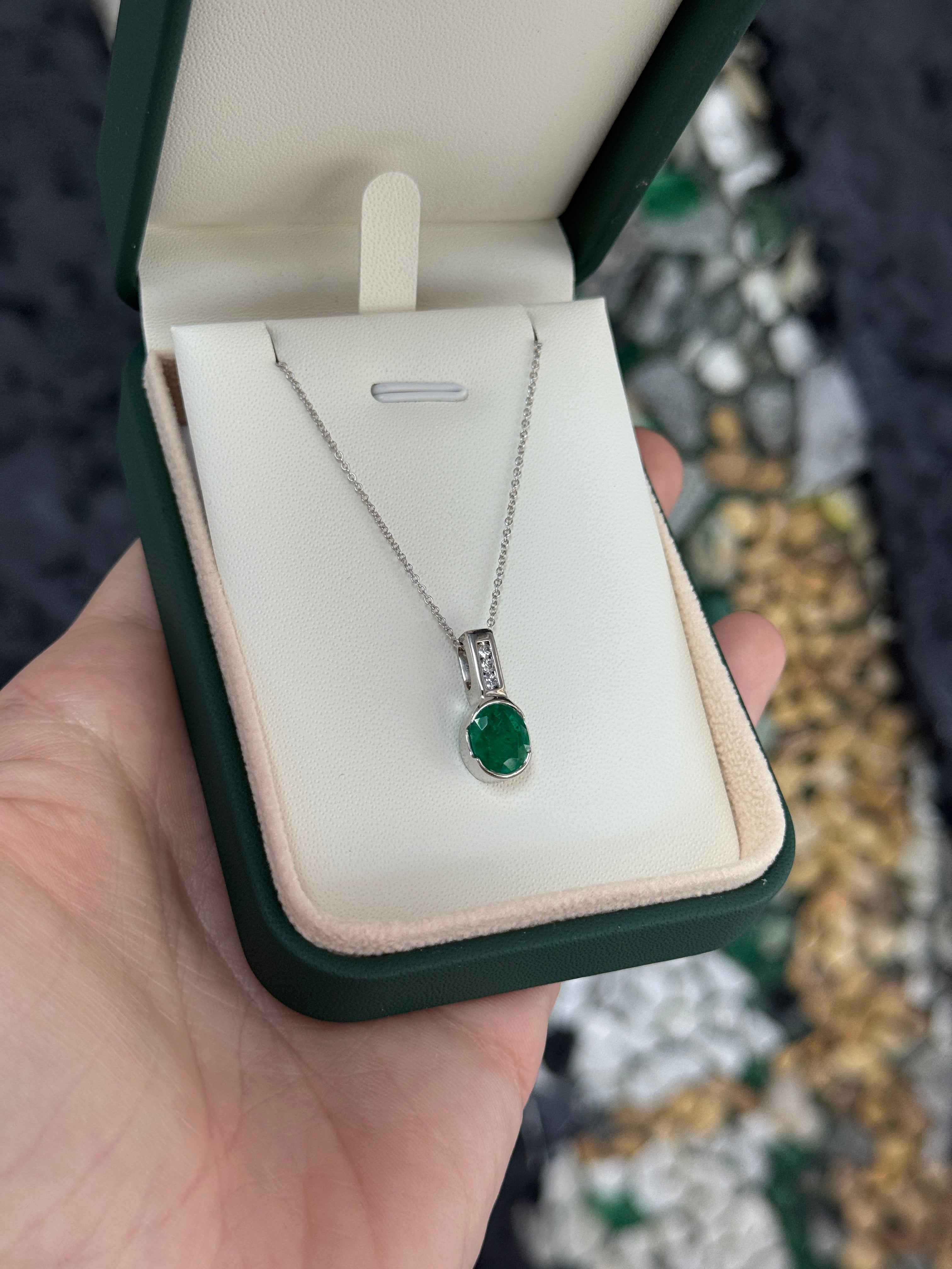 2.25tcw 14K Rich Oval Cut Emerald Half Bezel Set & Diamond Bale Accents