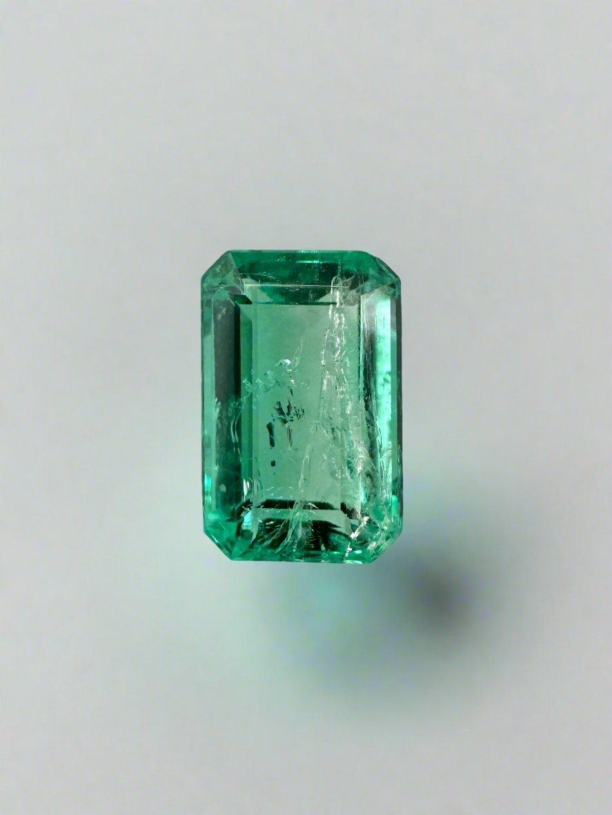 0.77 Carat 7x4.5 Glowy Loose Colombian Emerald-Emerald Cut