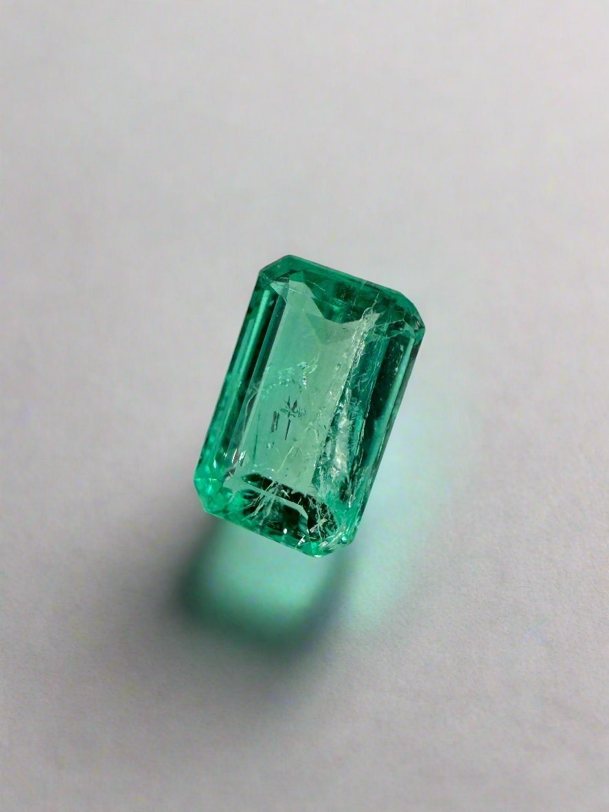 0.77 Carat 7x4.5 Glowy Loose Colombian Emerald-Emerald Cut