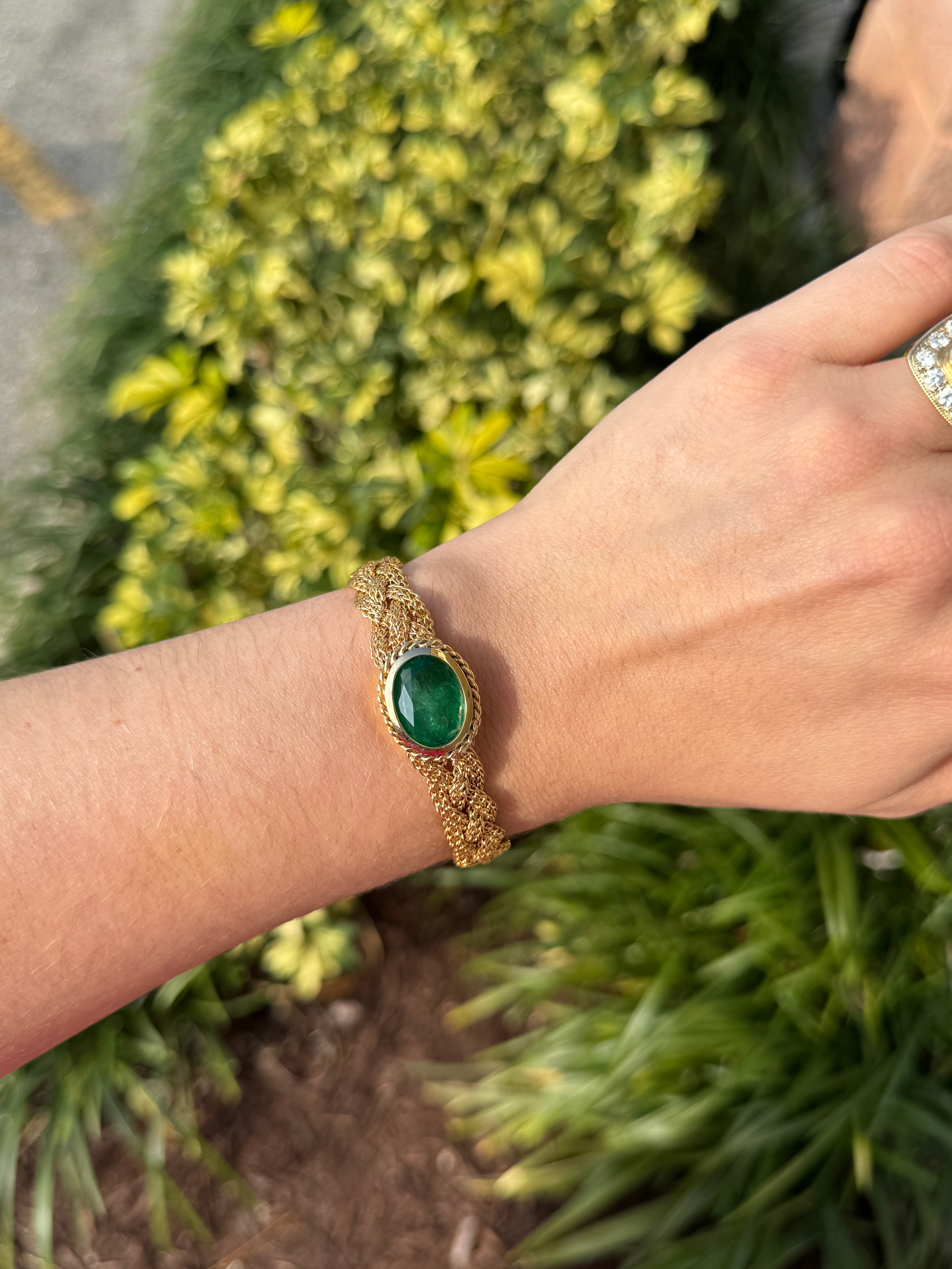 10.70 Carat Colombian Oval Emerald East West Bezel Bracelet In 14K Gold Vintage Revival Design