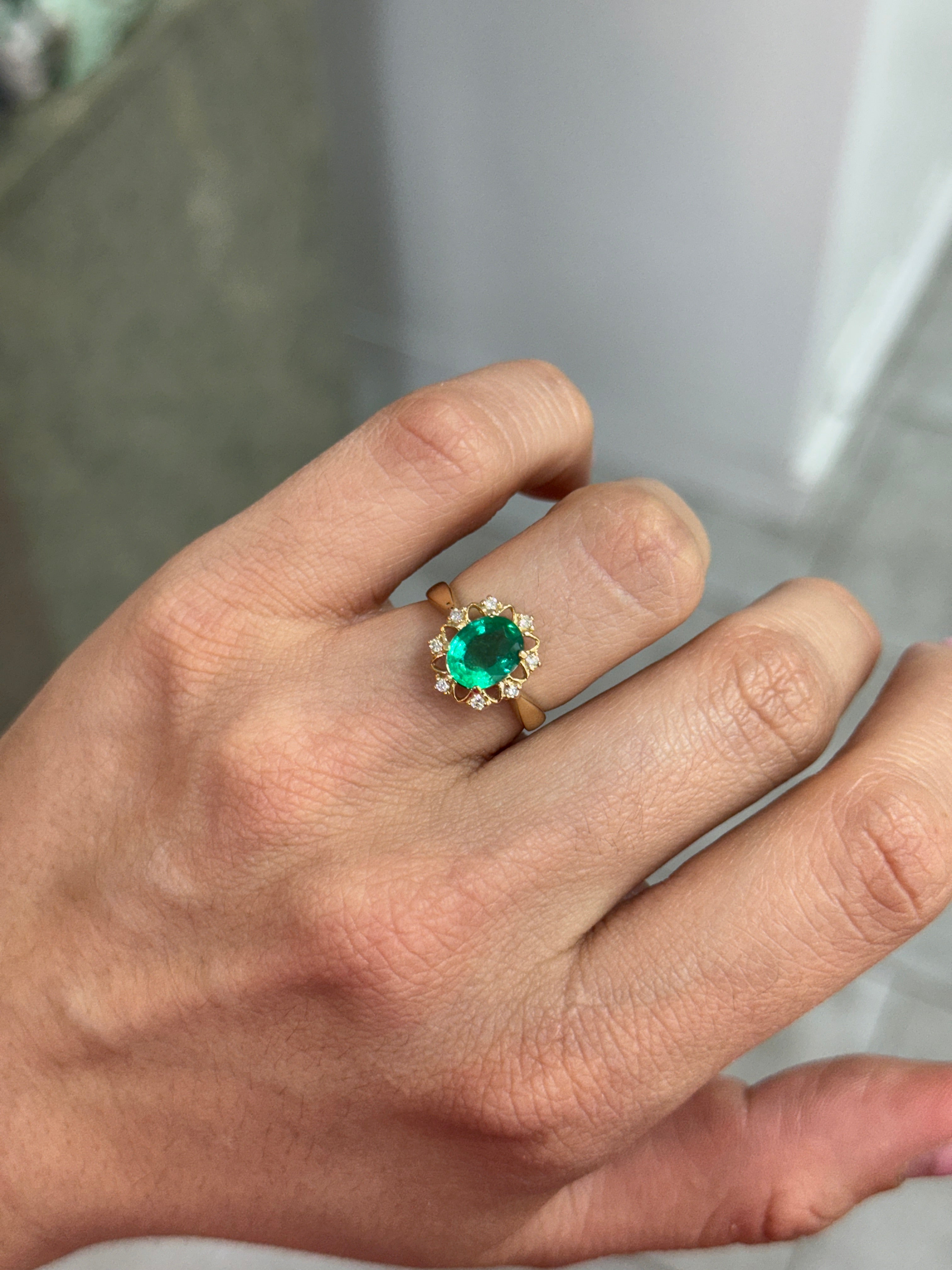 2.29tcw Emerald & Diamond Floral Halo Ring In 14K Yellow Gold Oval Cut Center