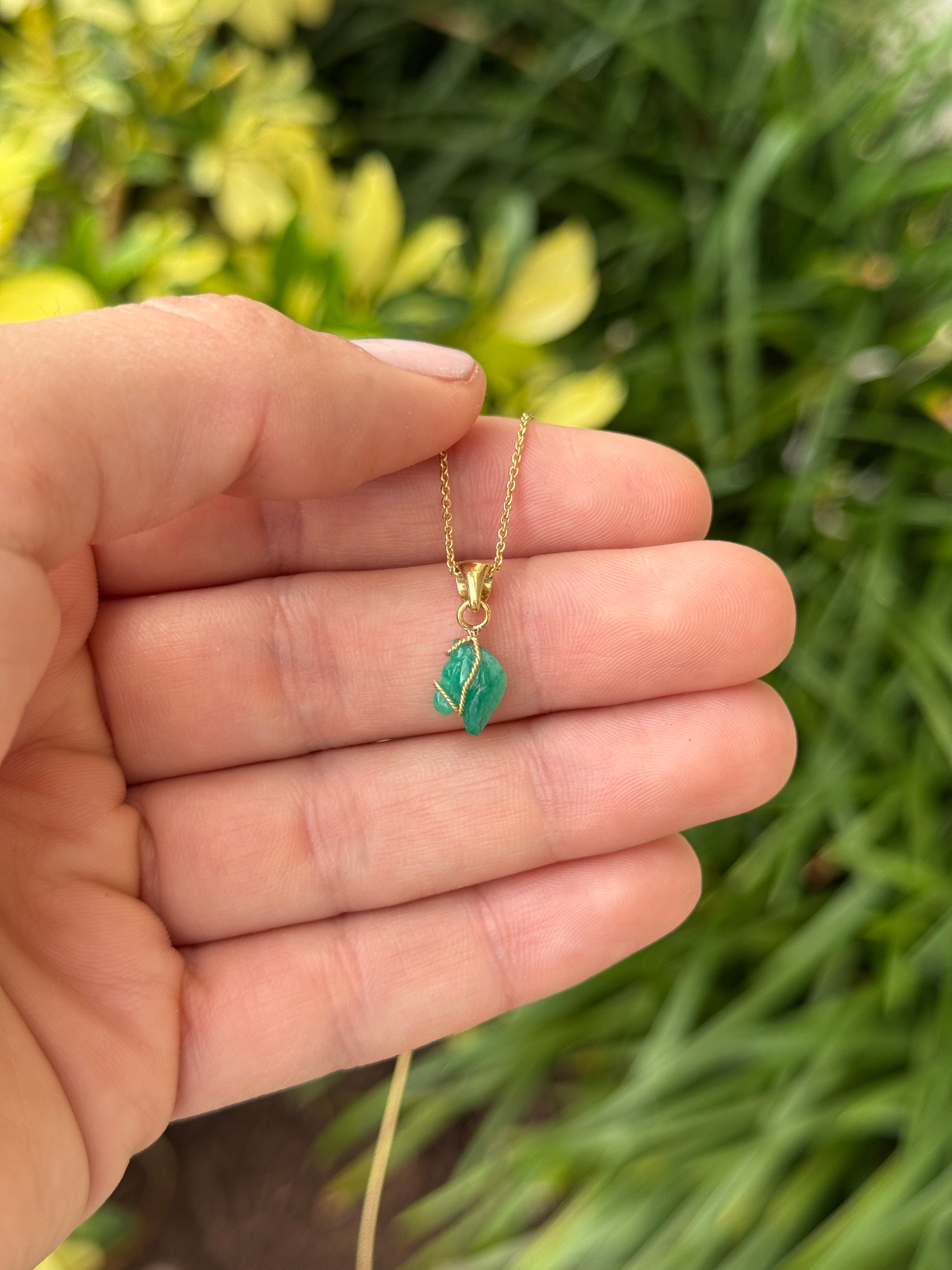 18K necklace featuring a 1.40 carat Chinese New Year horse Colombian emerald pendant by JR Colombian Emeralds.