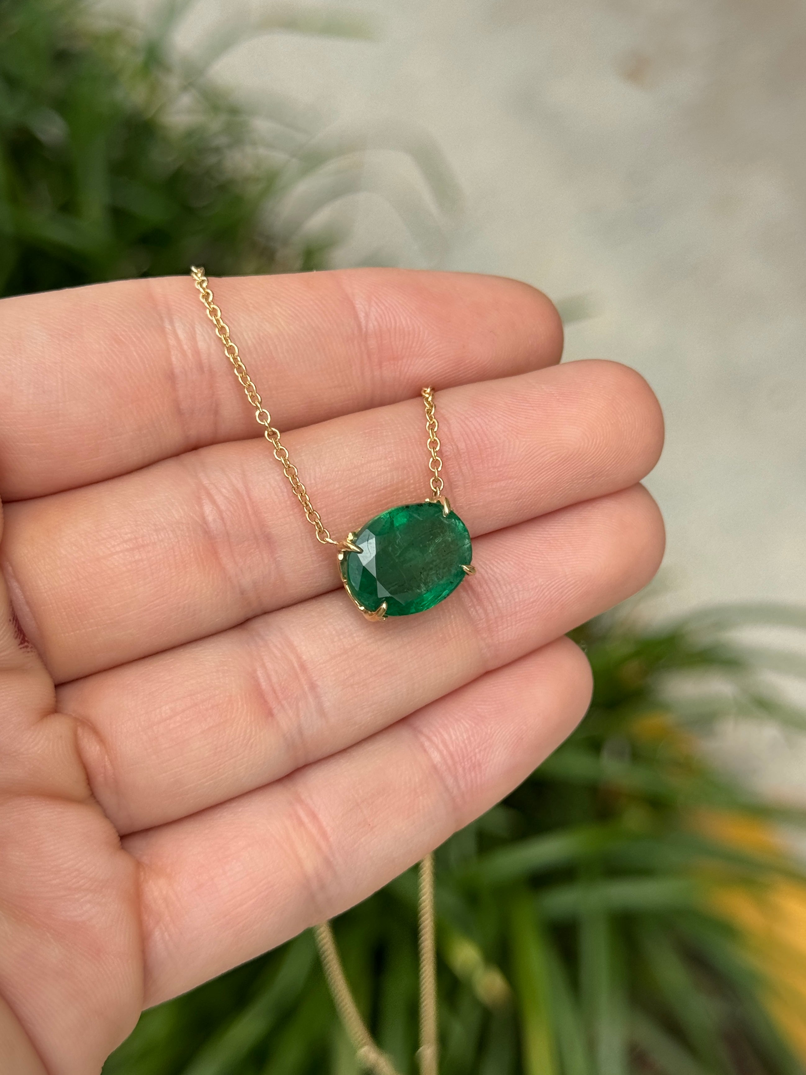18K gold emerald necklace with oval station pendant and Fleur De Lis design, featuring a 6.80ct natural Colombian emerald by JR Emeralds