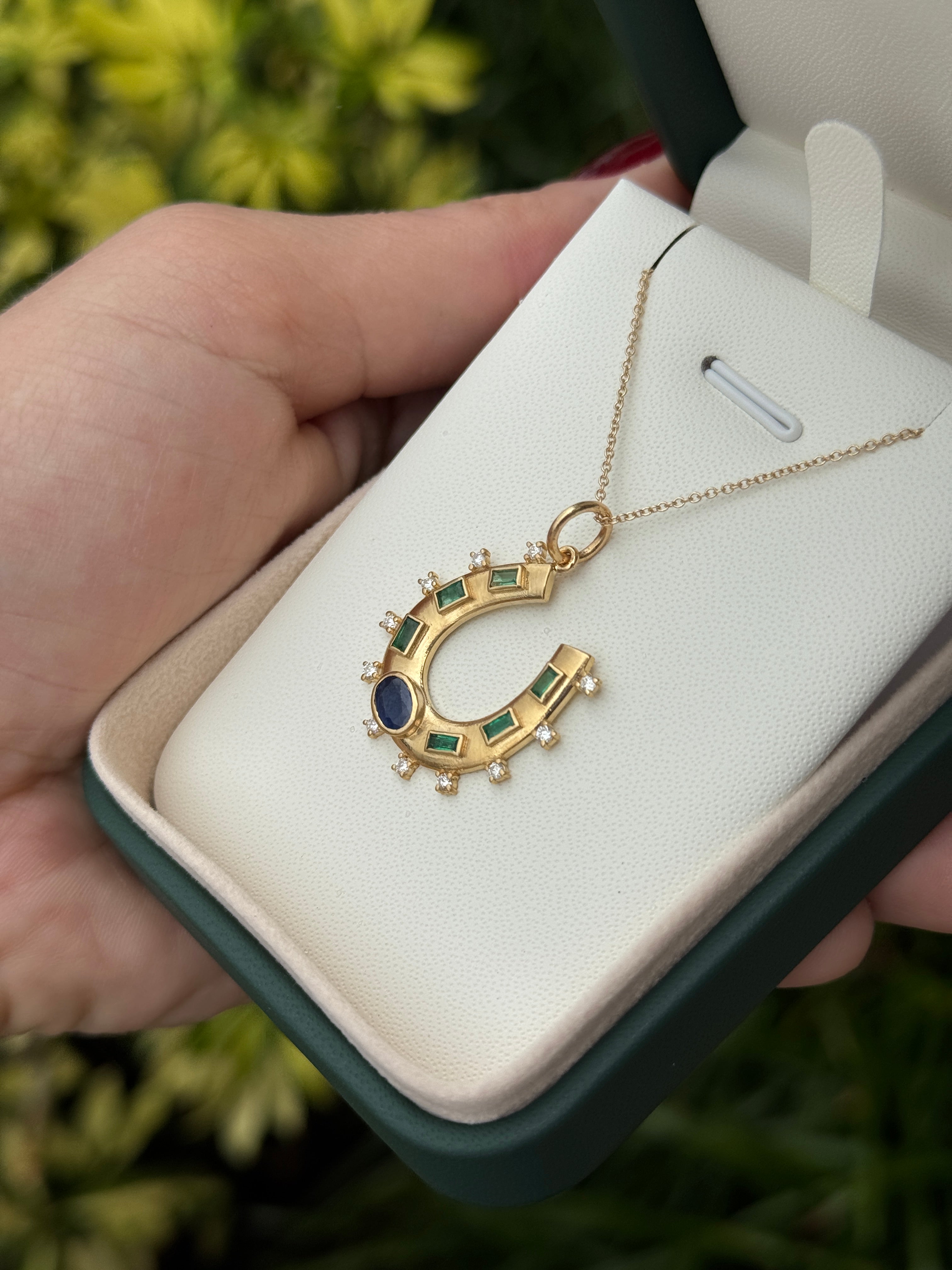 14K gold horseshoe charm pendant with 1.26tcw natural sapphire, emerald, and diamond accents, jewelry by JR Colombian Emeralds