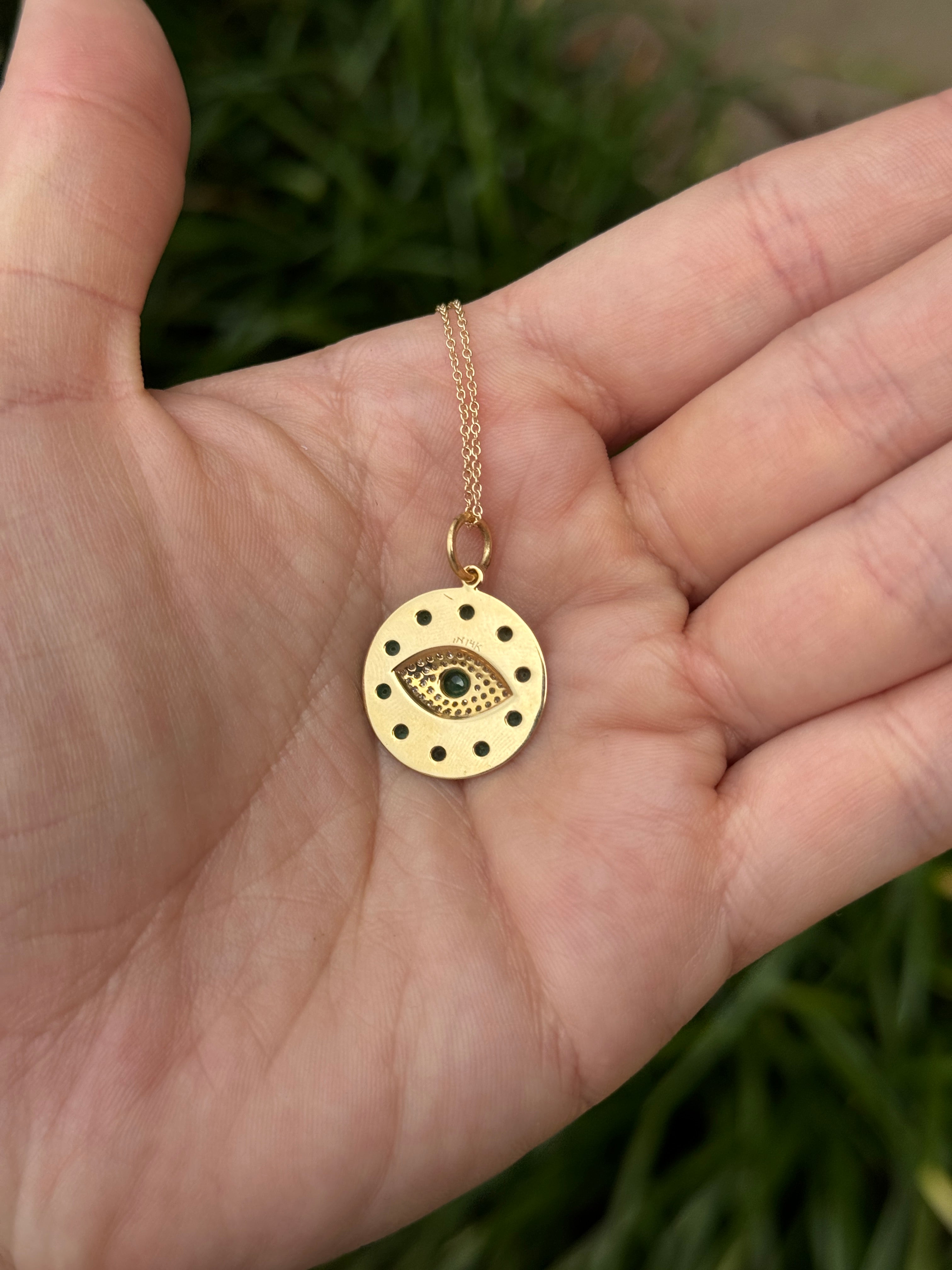 14K gold emerald and diamond evil eye charm pendant with natural emeralds and protective design, by JR Colombian Emeralds.