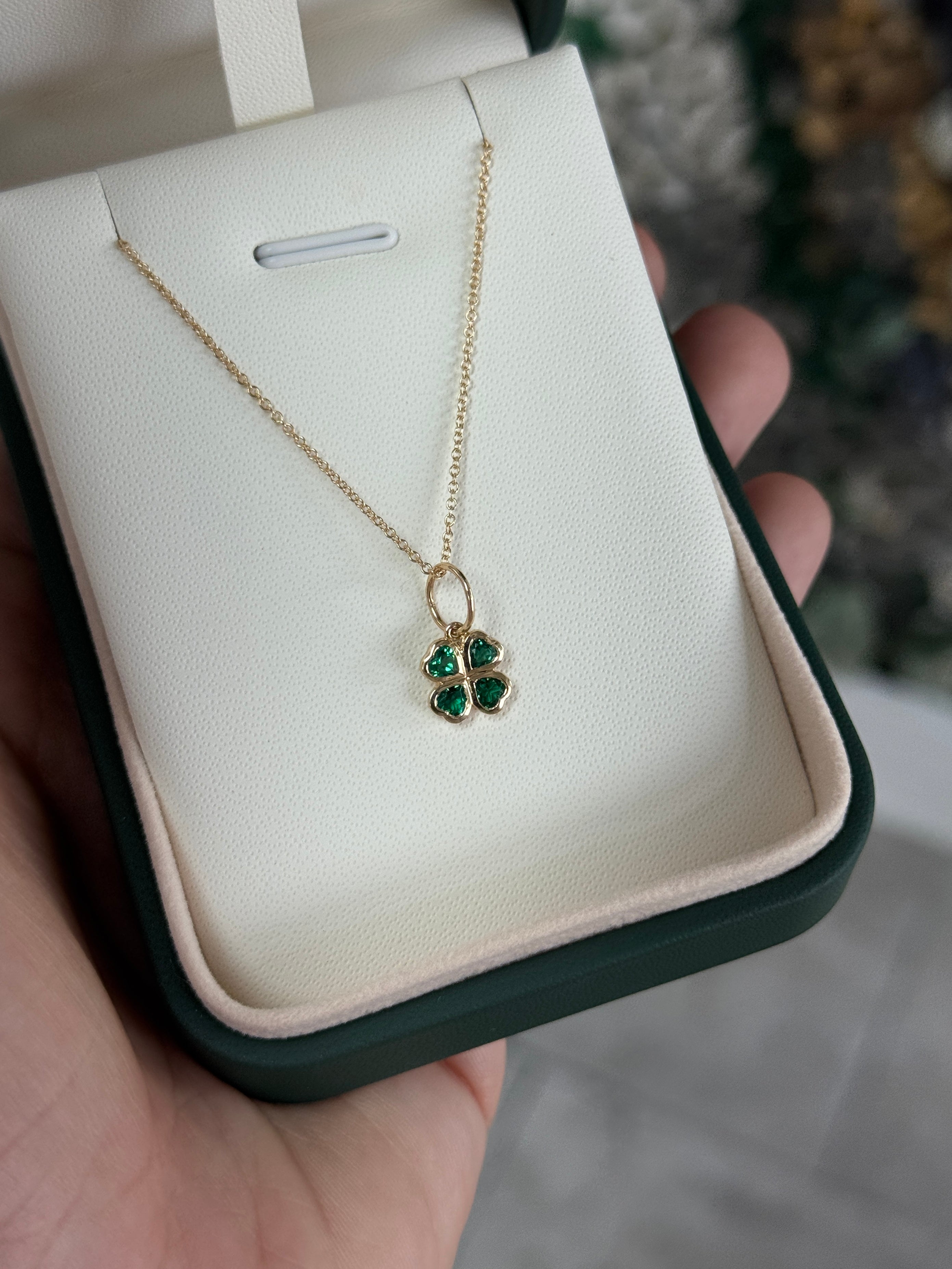 14K gold heart cut emerald clover charm pendant with 0.44tcw diamonds by JR Colombian Emeralds, showcasing detailed craftsmanship.