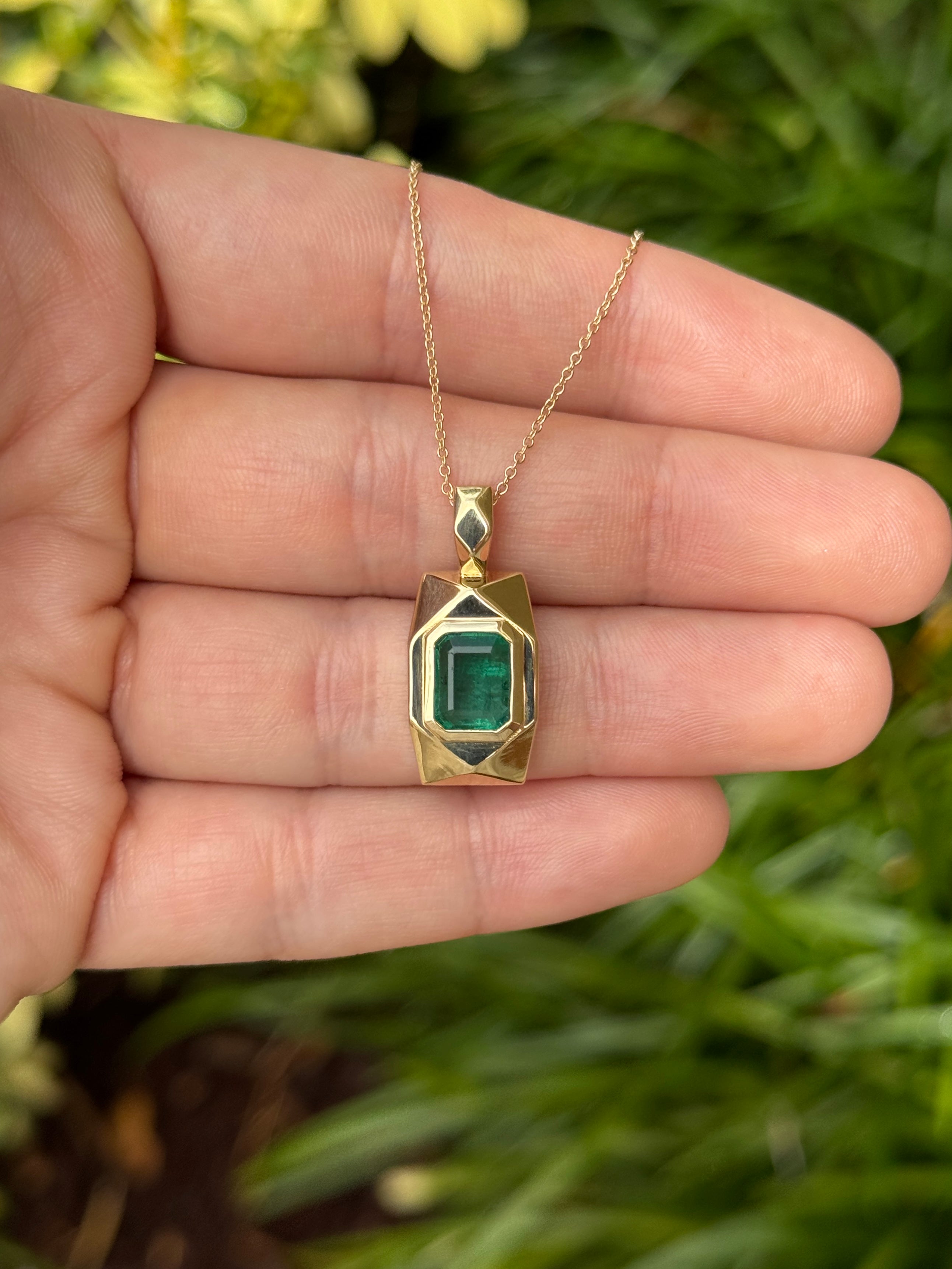 14K emerald dog tag pendant featuring a 2.35 carat emerald gemstone, crafted by JR Colombian Emeralds.