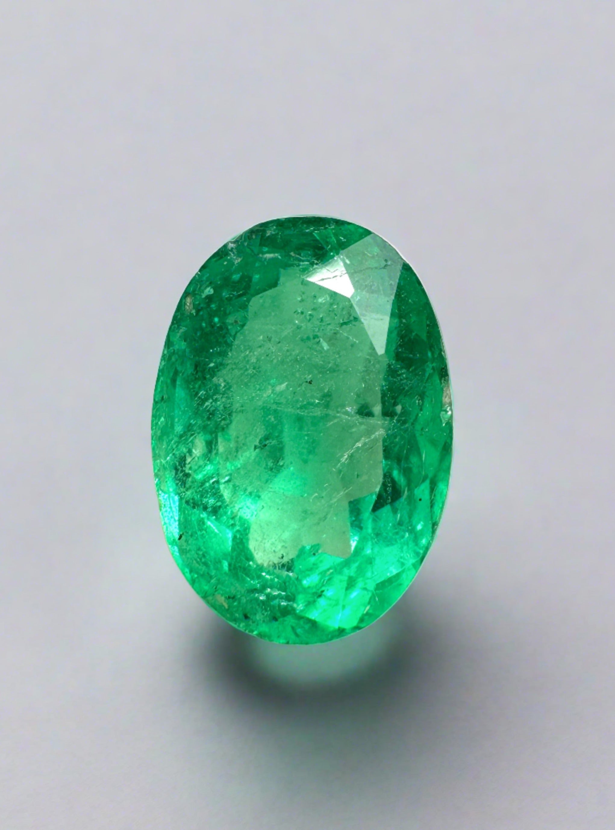 1.69 Carat 9x6 Medium Yellowish Green Natural Loose Colombian Emerald-Oval Cut - JR Colombian Emeralds