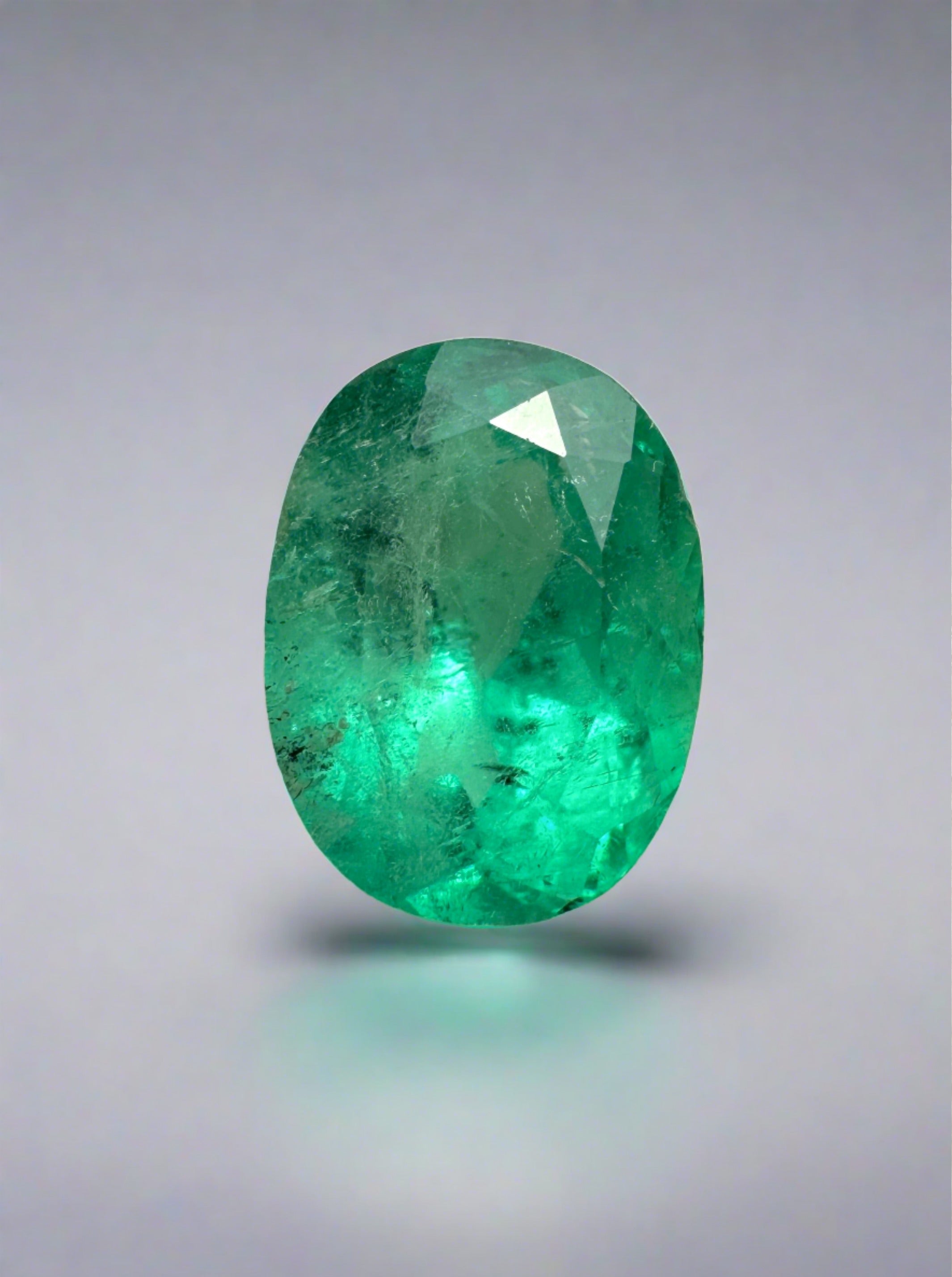 1.74 Carat 9x7 Freckled Bluish Green Natural Loose Colombian Emerald-Oval Cut - JR Colombian Emeralds