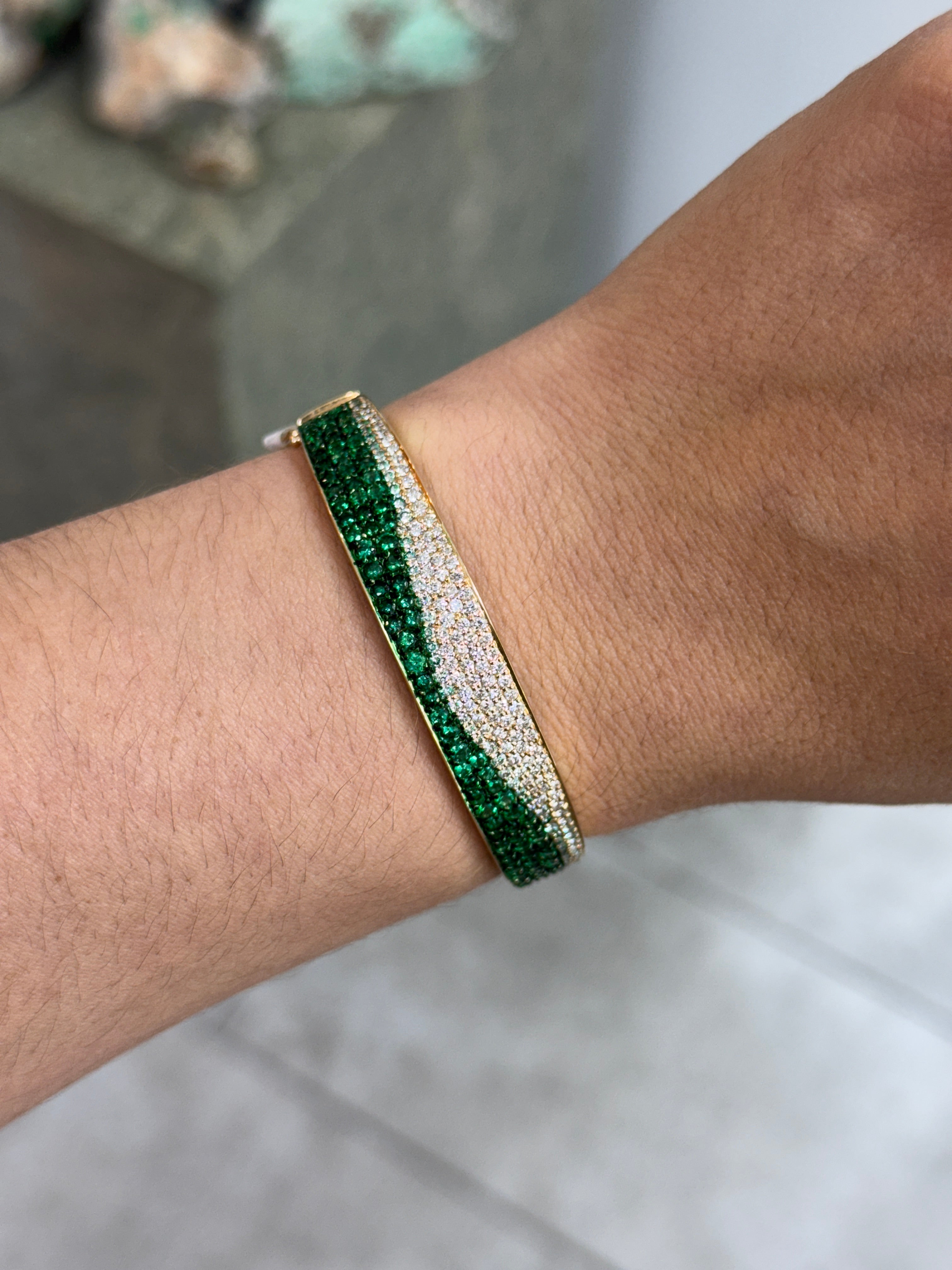 14K natural emerald and diamond ombre bangle bracelet with black and green rhodium from JR Colombian Emeralds, showcasing intricate design.