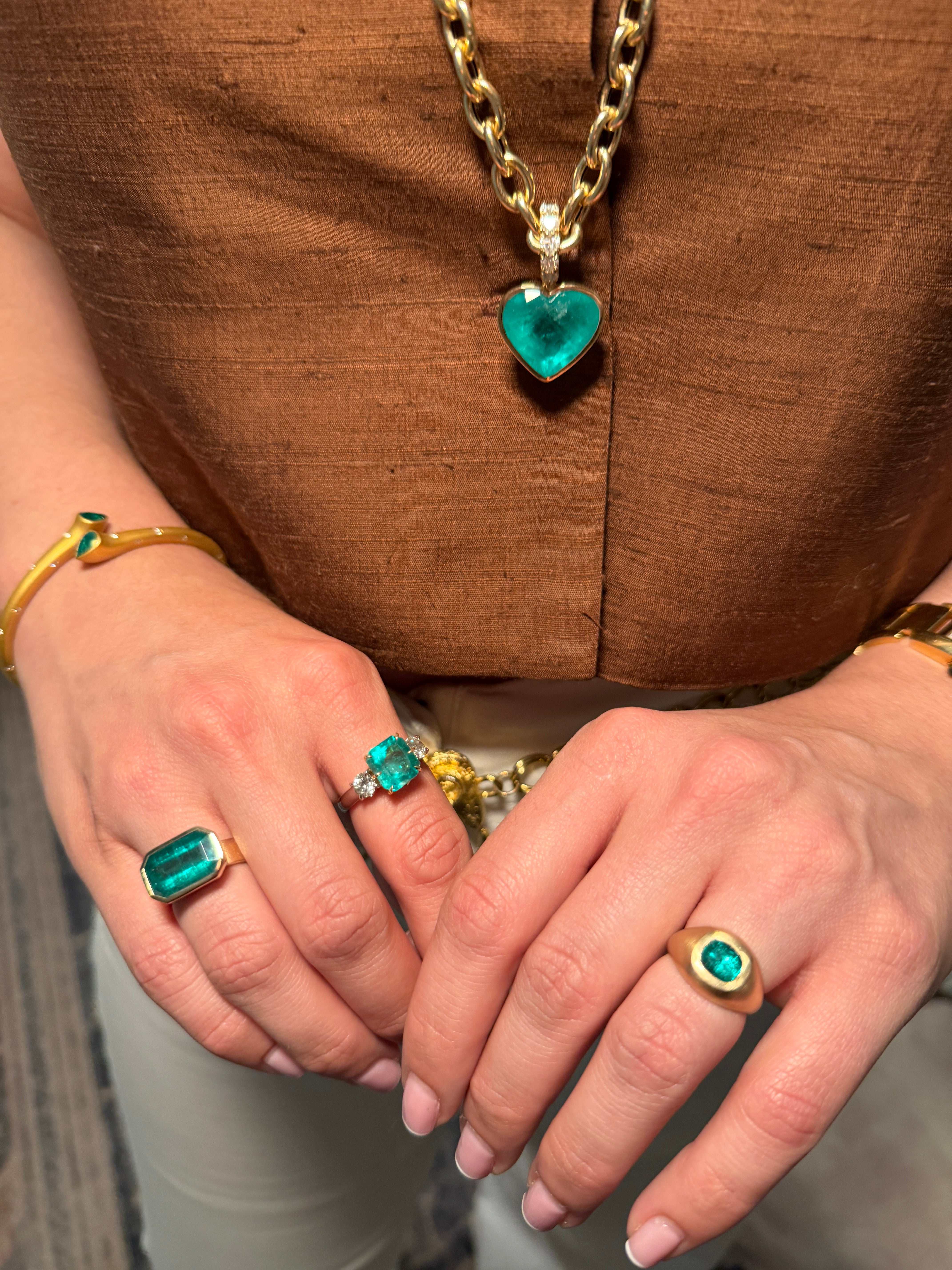 Ladies 1.30 Carat Colombian emerald gypsy ring in 14K gold with bezel setting from JR Colombian Emeralds.