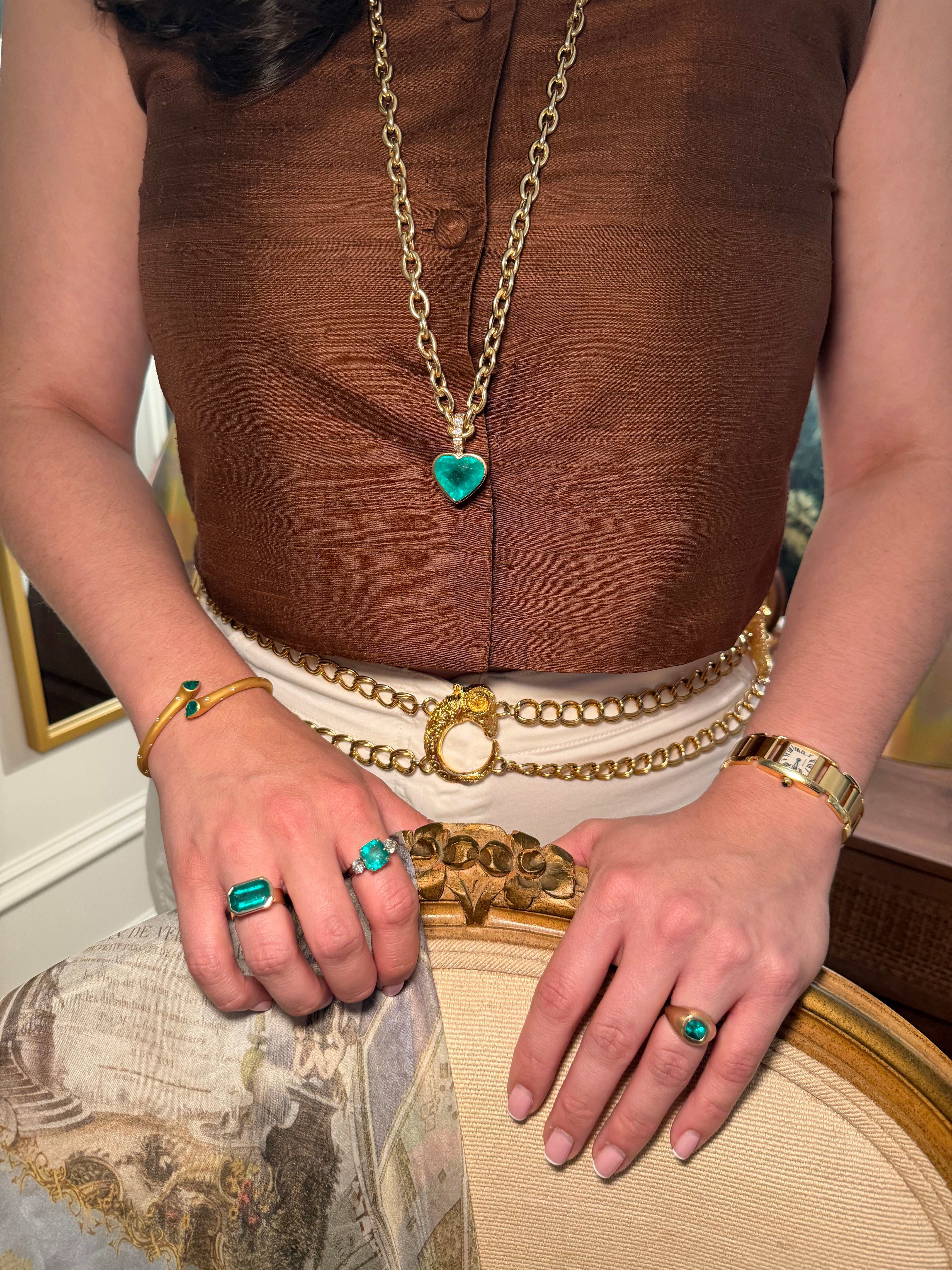 Ladies 1.30 carat bezel set Colombian emerald gypsy ring in 14K gold by JR Colombian Emeralds, showcasing the emerald's rich green hue.