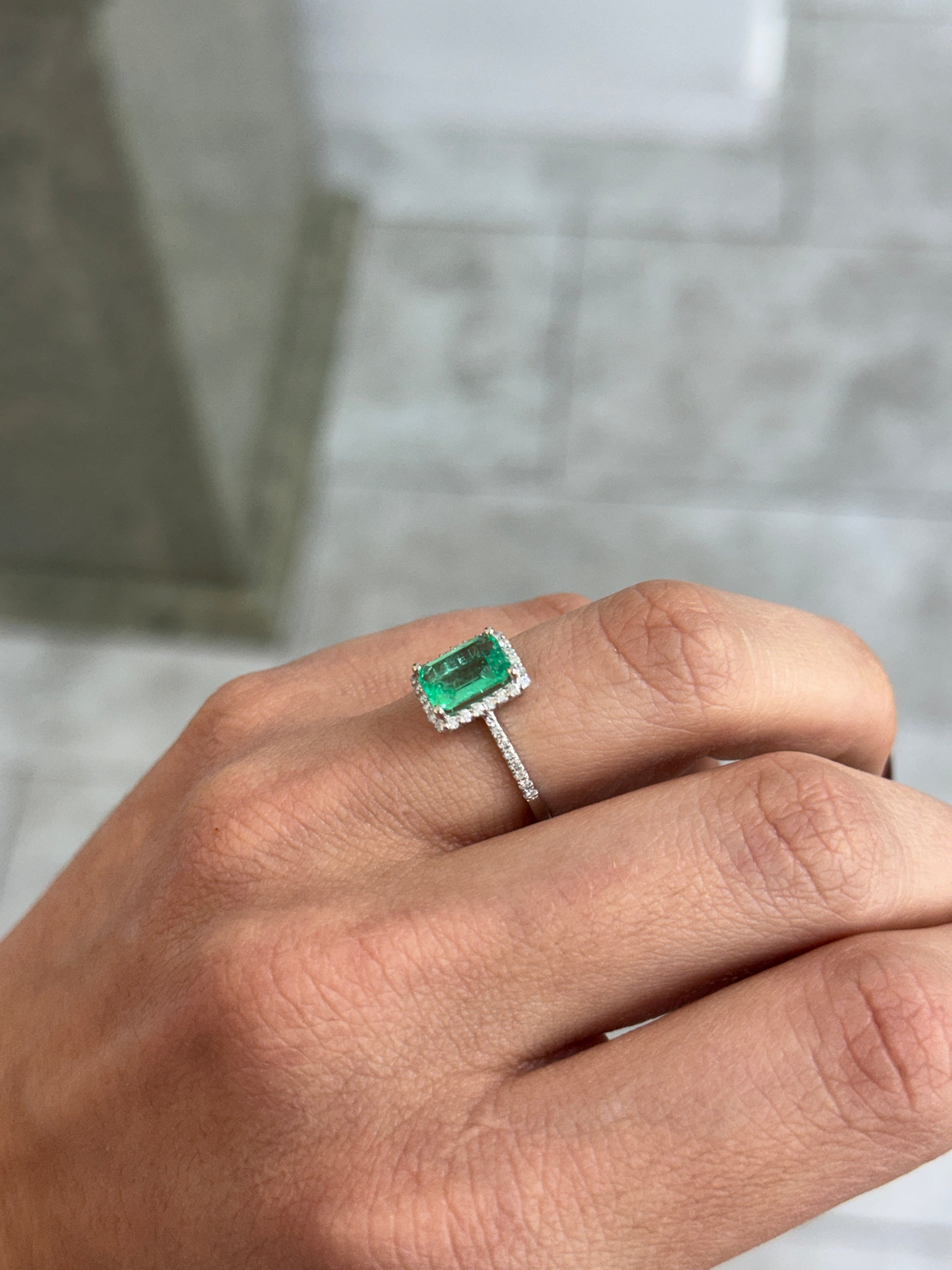 JR Colombian Emeralds 1.70tcw crystal clear Colombian emerald and diamond halo engagement ring in 14K white gold.