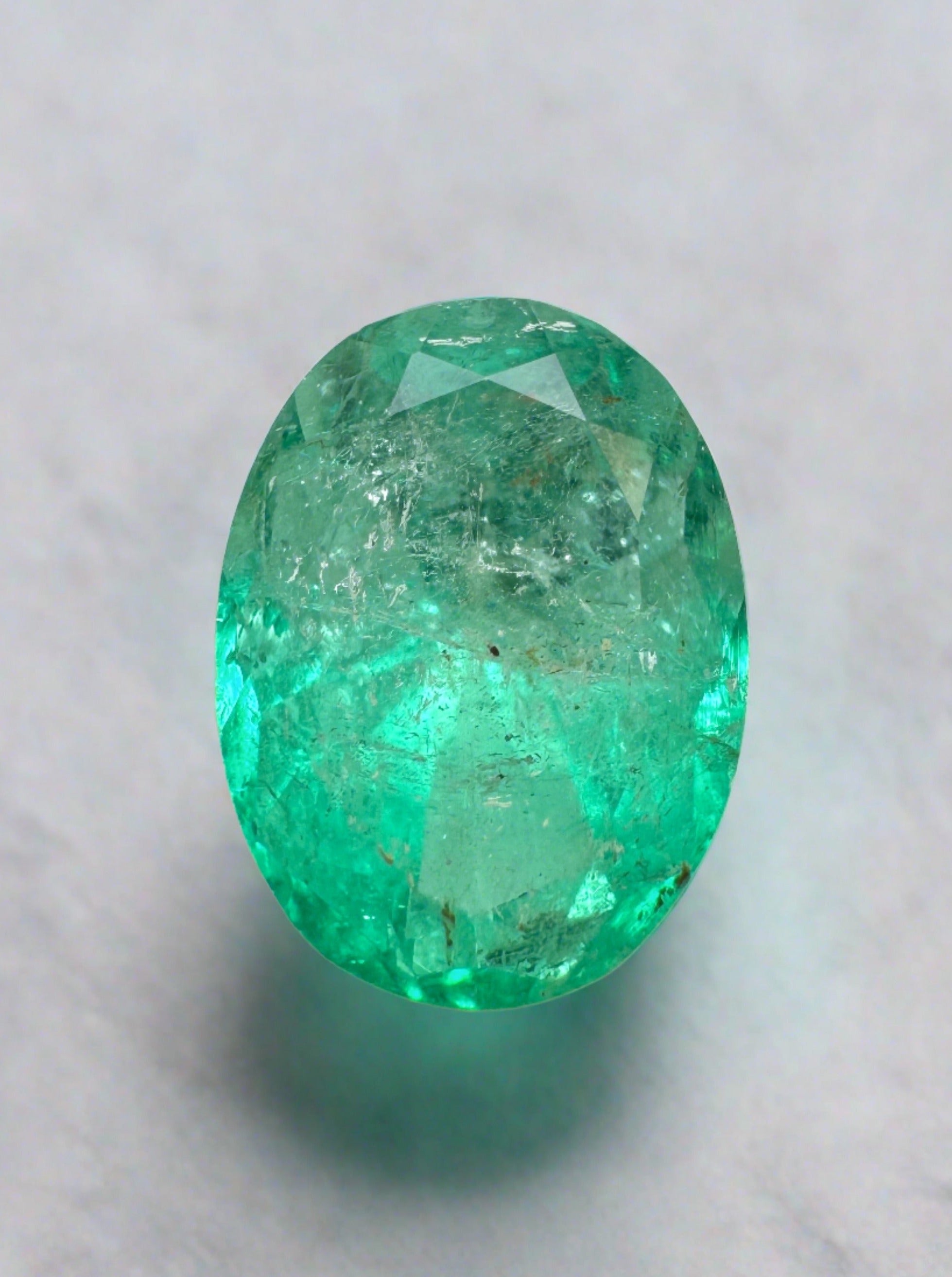 2.75 Carat Lightly Freckled Green Loose Colombian Emerald-Oval Cut - JR Colombian Emeralds