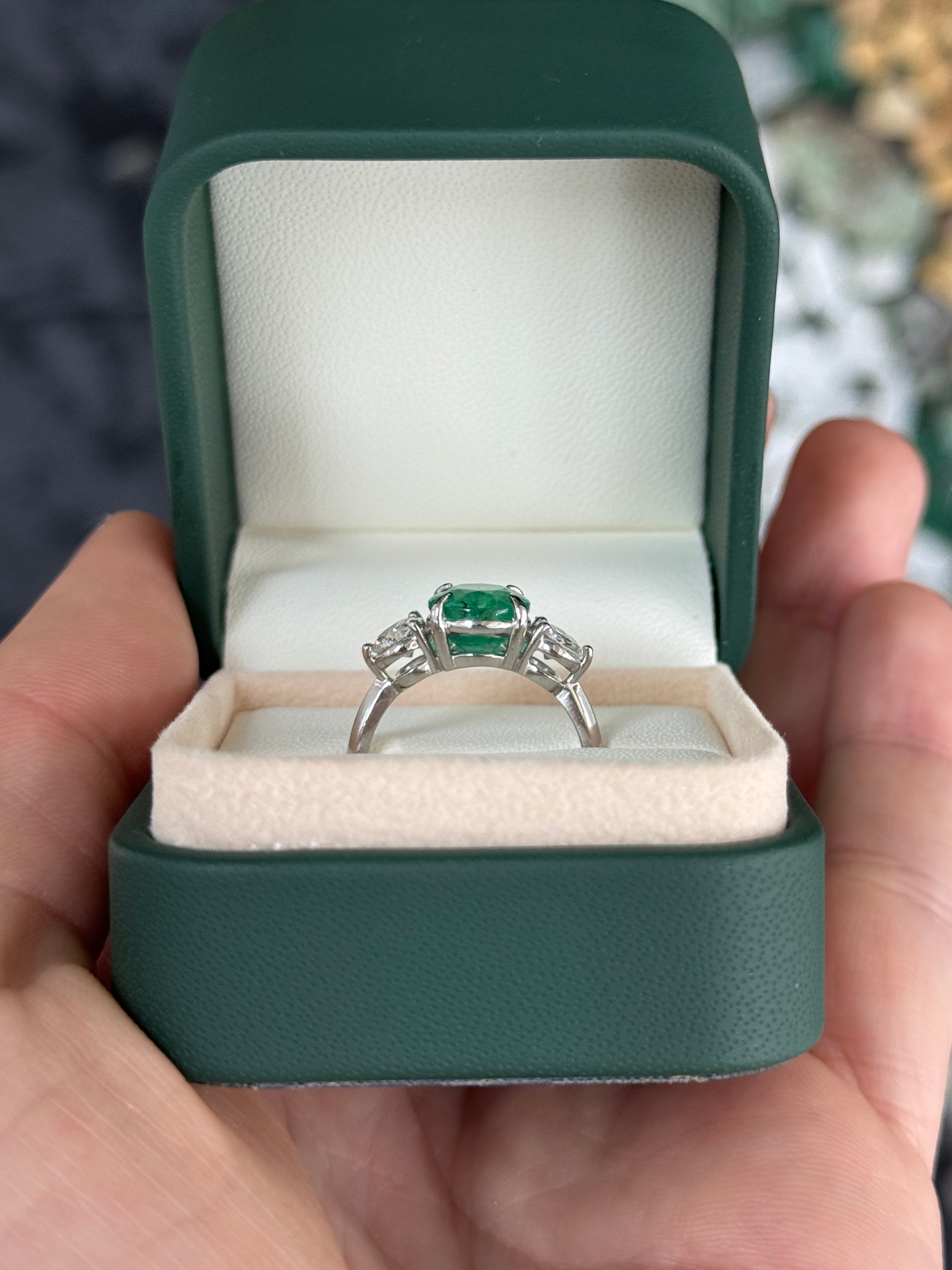 14K white gold 2.91tcw emerald and diamond 3-stone engagement ring by JR Colombian Emeralds, featuring central emeralds and sparkling diamonds.